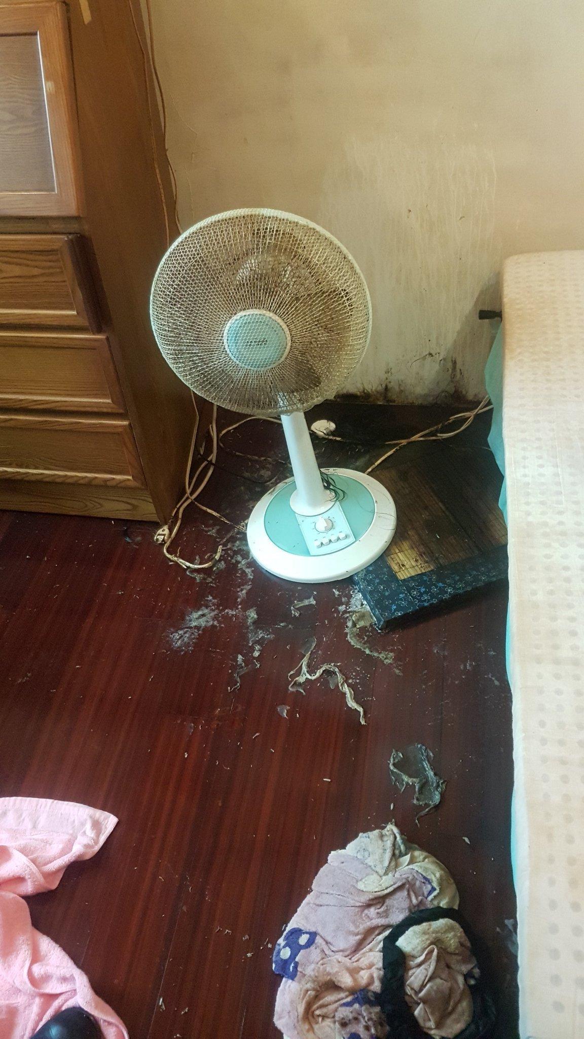 一名離婚獨居的男子身亡後,沒留下什麼值錢的遺物,唯一珍藏的是女兒從小到大的照片。(盧致宏提供)