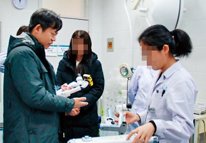 林中天（左）於檢廉調查期間火速辭職，緩刑之後「華麗轉身」被台大回聘。（翻攝中國農業動物醫院官網）