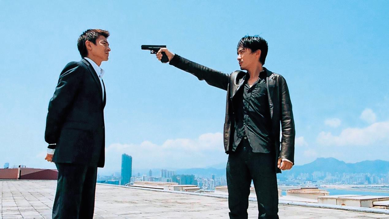 劉德華(左)與梁朝偉(右)主演的《無間道》由麥兆輝與莊文強共同編劇,打響兩人名號。(翻攝自www.hk01.com)