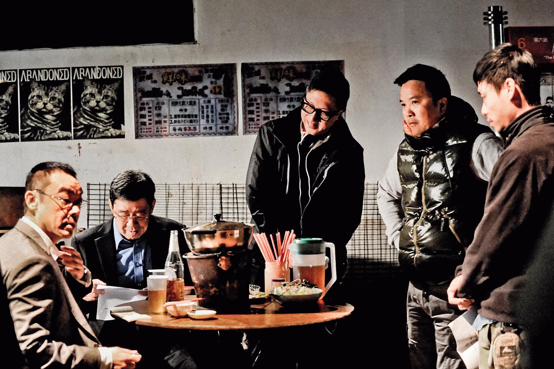 麥兆輝(右二)與莊文強(右三)聯合編導的《竊聽風雲2》,曾入圍香港電影金像獎最佳導演與編劇。(東方IC)