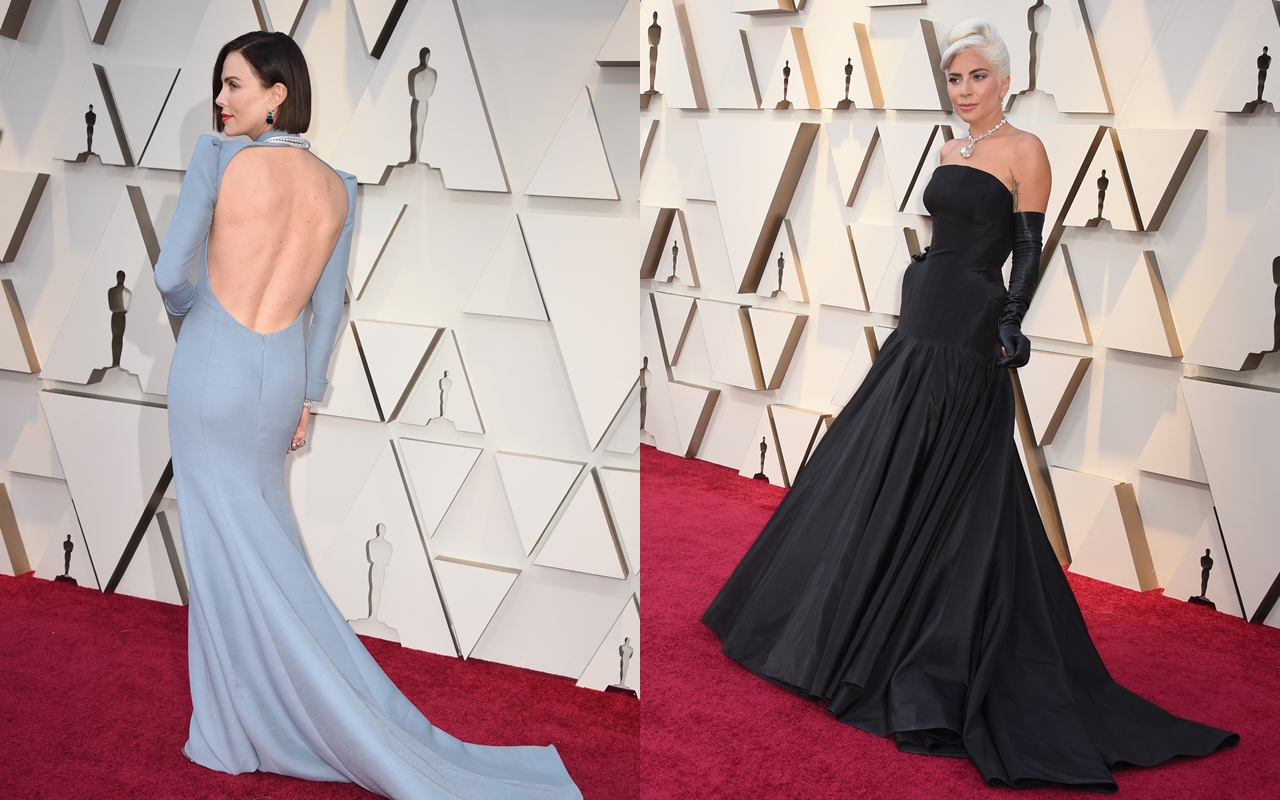 女神卡卡顯然早知道今年的背板顏色是白的，透過這身黑色長禮服，加上白色頭髮，的確是雍容華貴，又帶有她的個人色彩，左為莎莉賽隆。（東方IC）