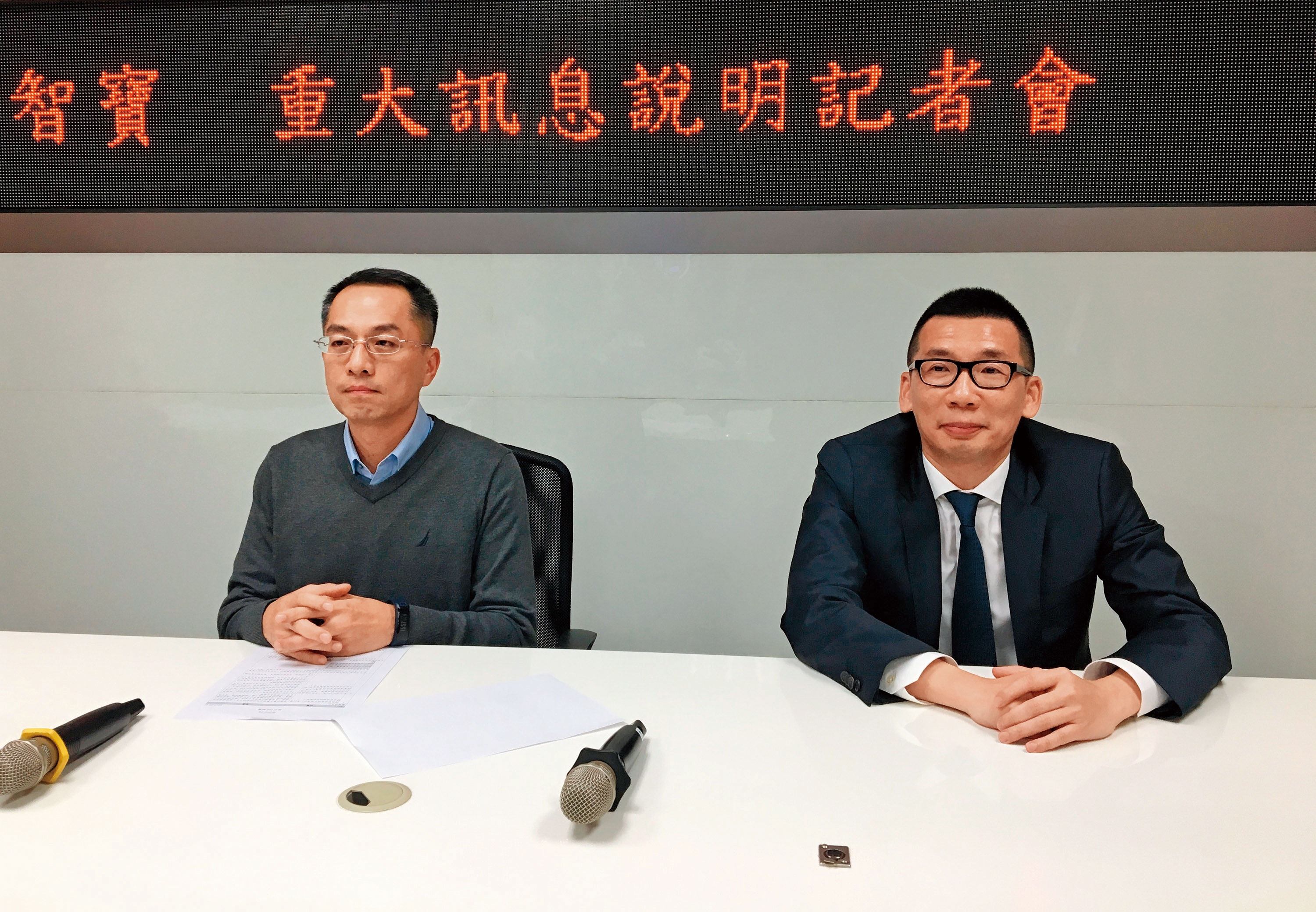 國巨旗下智寶合併凱美，擴大鋁質電解電容市占，圖為智寶董事長張維祖（左）和凱美董事長翁啟勝（右）。（中央社）