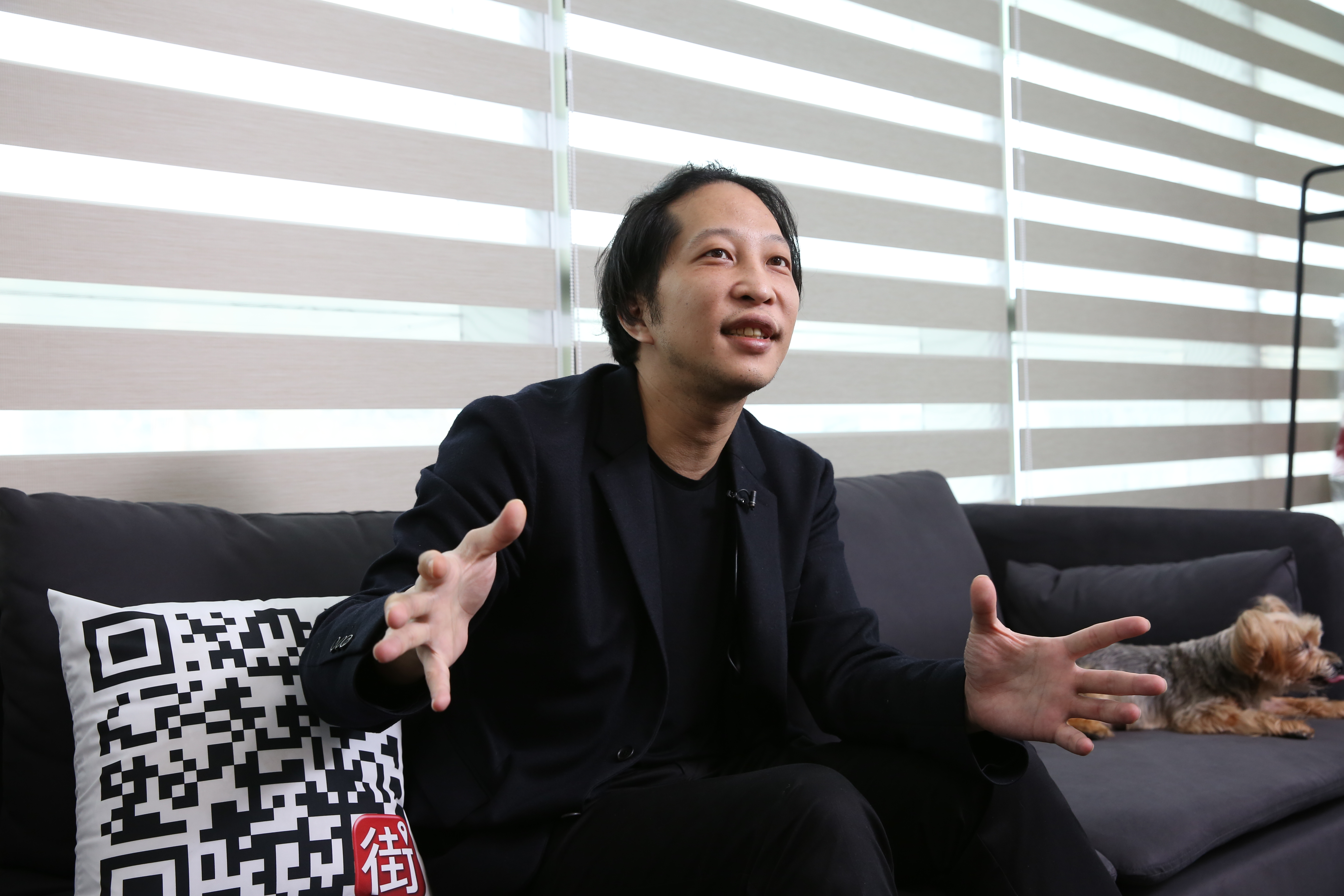 胡亦嘉入股國票華頓投信並兼職執行長，讓金管會不滿。