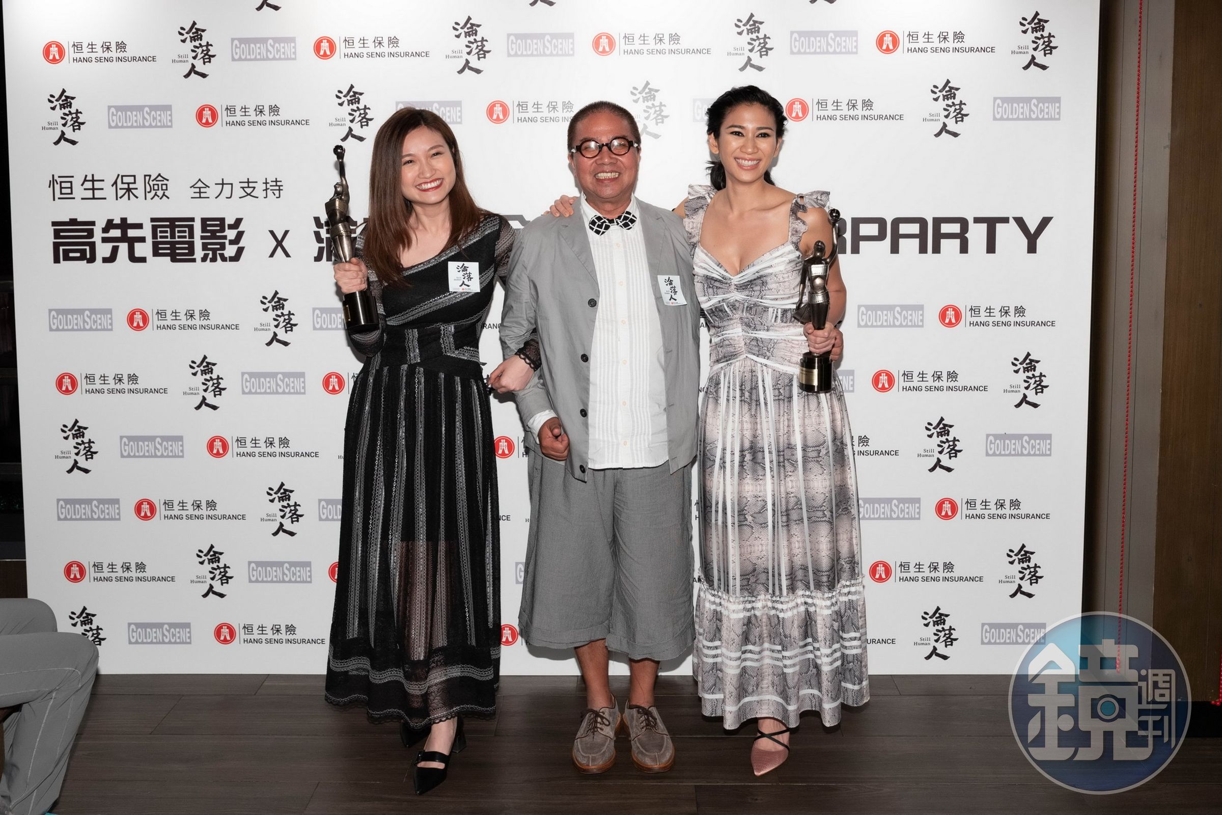 《淪落人》奪得3項大獎，監製陳果開心地與新導演得主陳小娟及新人獎姬素孔尚治合影。（甲上提供）