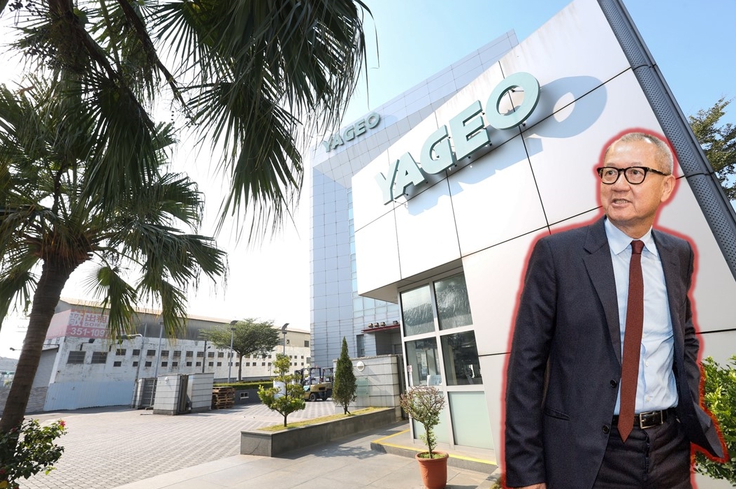 被動元件龍頭國巨回台投資高雄165億元，獲得經濟部「歡迎台商回台投資行動方案」核准專案貸款。右為國巨董事長陳泰銘。