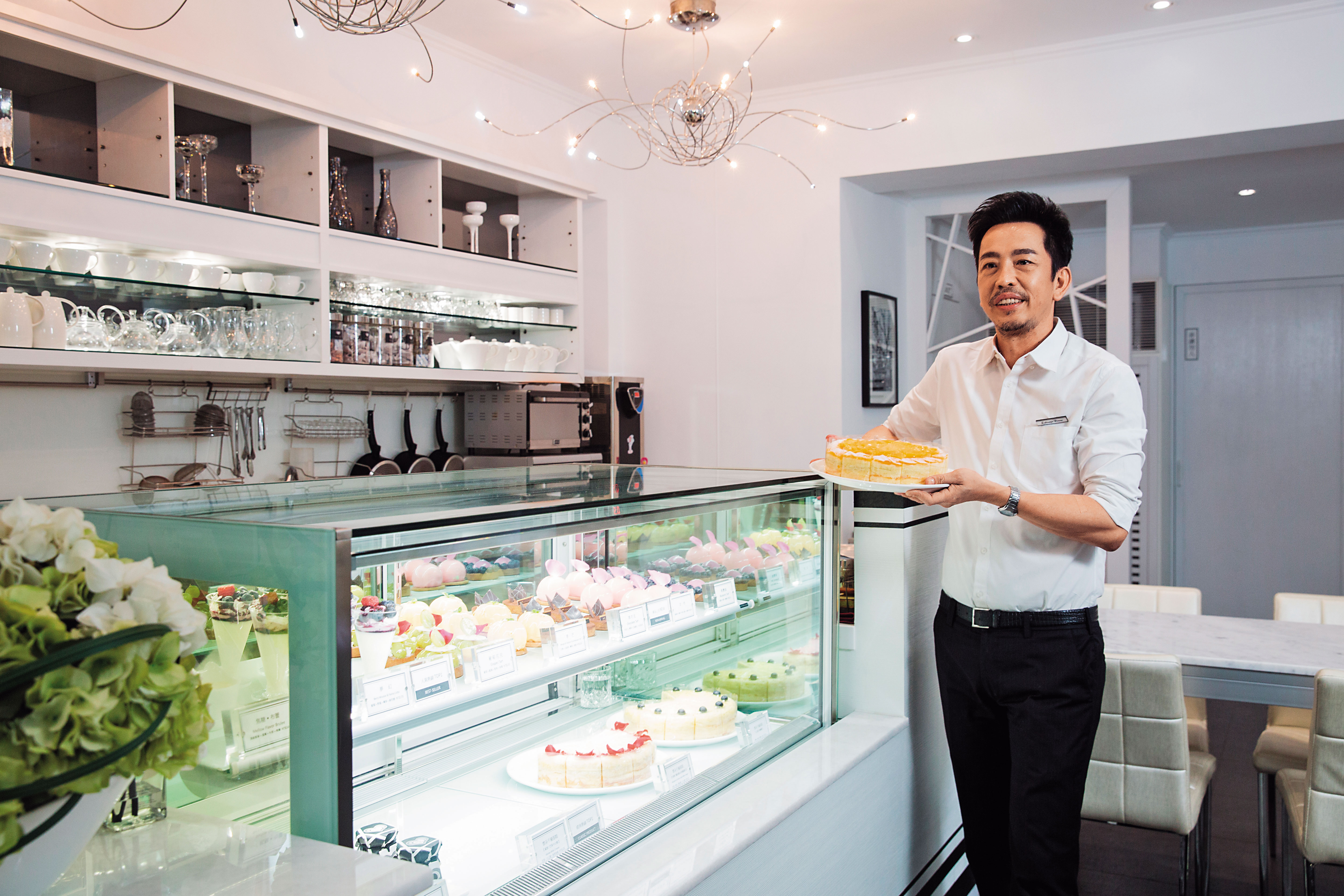 Rico喜愛簡約風格，店內裝潢、產品包裝都以黑、白色系為主。