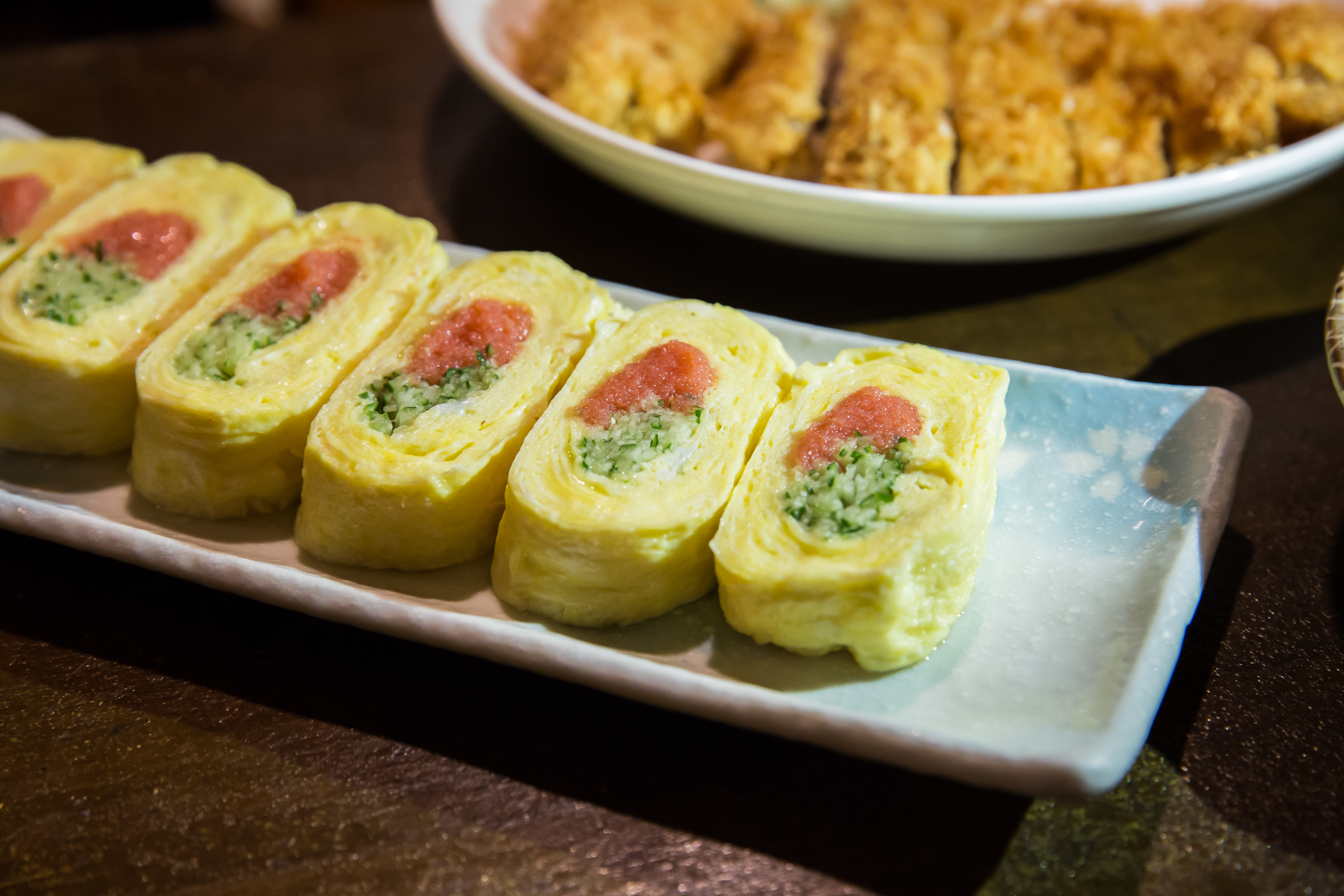 明太子卷是和幸居酒屋的招牌料理之一。（200元／小份）