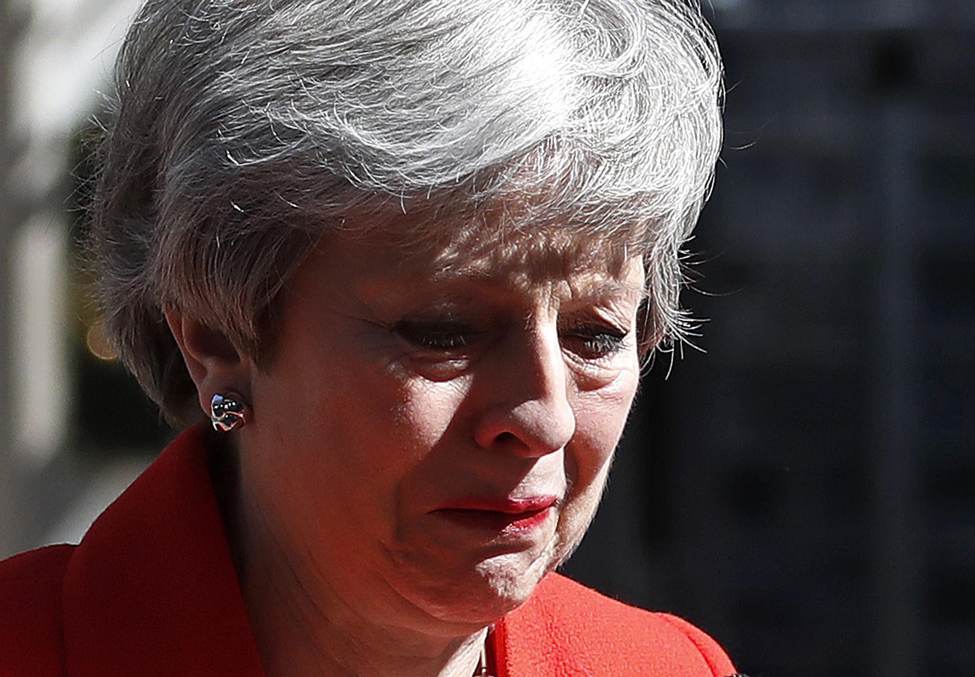 2019年5月24日,英國首相梅伊在首相官邸外宣布將在6月7日辭去保守黨黨魁職務。(達志影像)