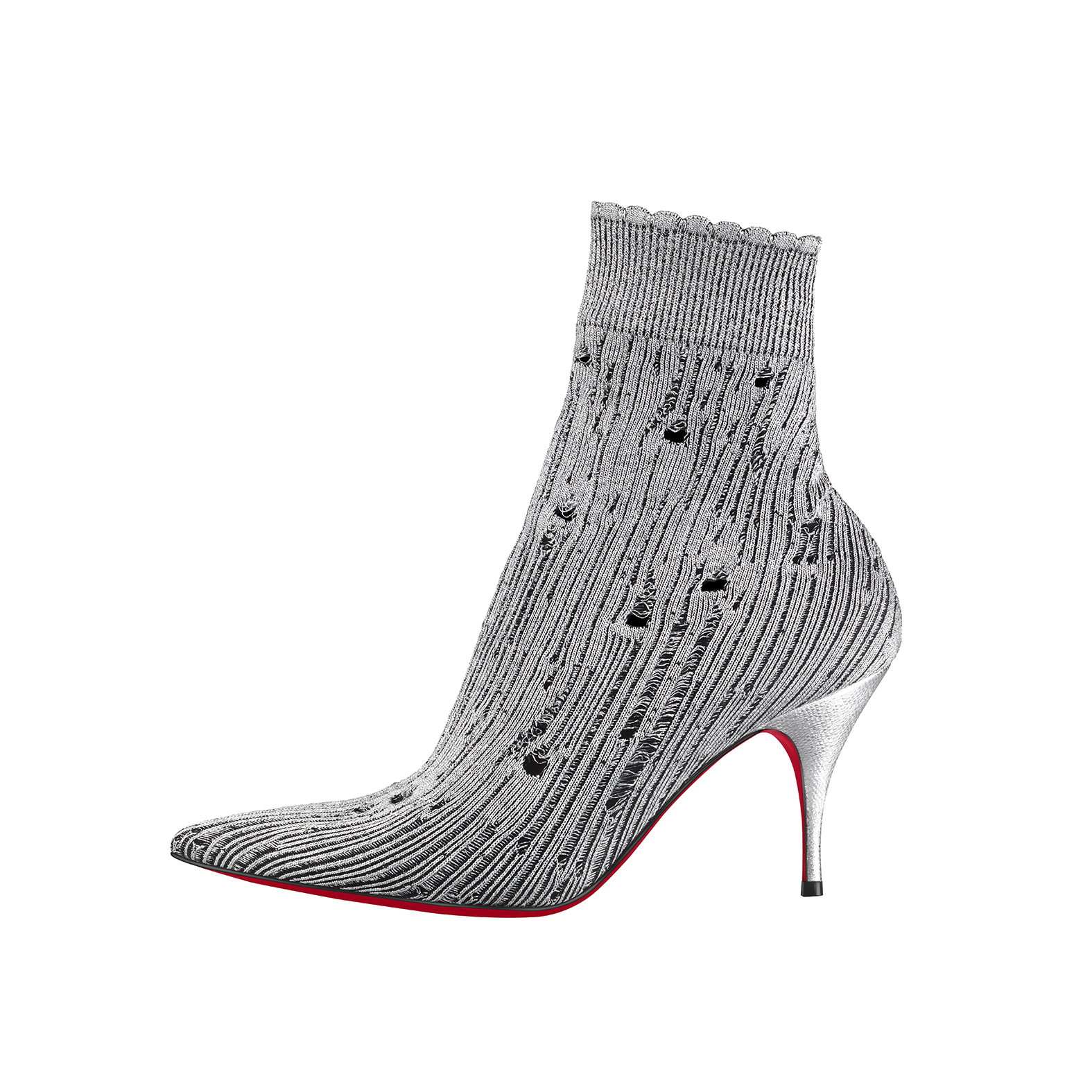 以白雪皚皚的喜瑪拉雅山為靈感的八公分高短靴。NT$37,600（Christian Louboutin提供）
