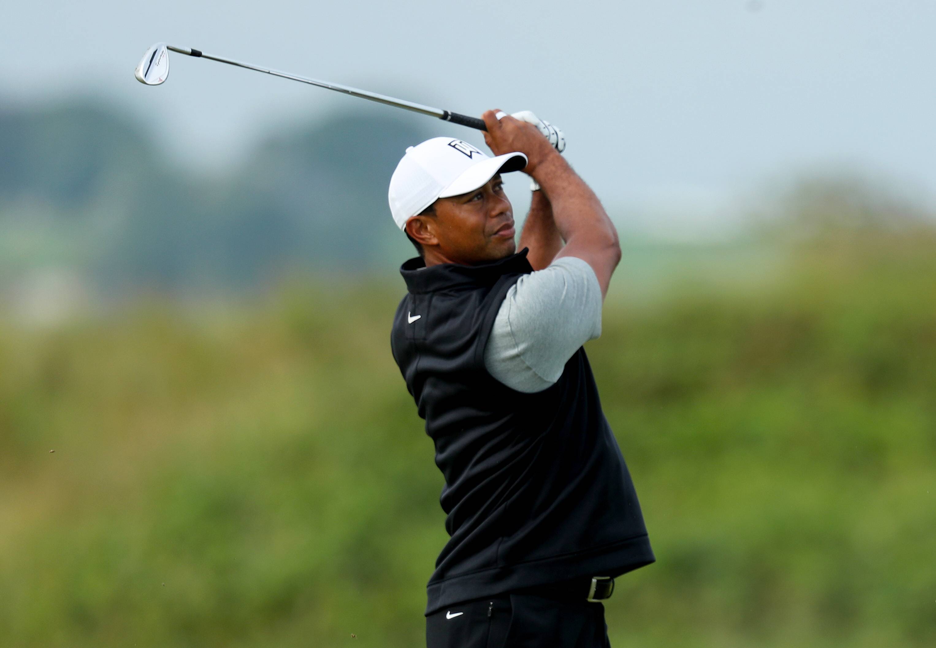 高球名人老虎伍茲是從小就受父母刻意栽培的代表性人物。（東方IC）