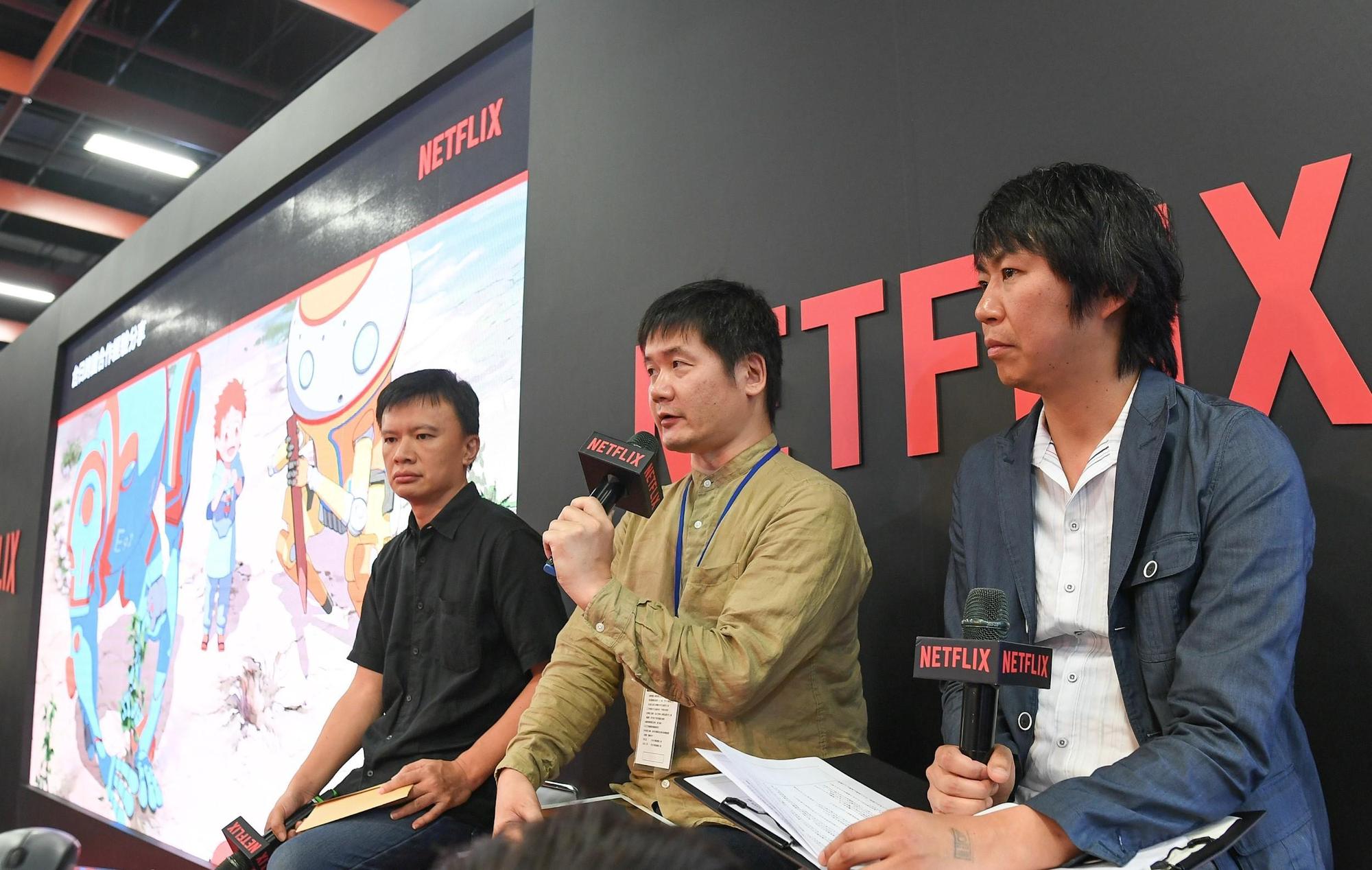 Netflix原創動畫影集《伊甸》（Eden）幕後創作團隊於台北漫博會首日共同出席講座，分享創作過程與跨國合作經驗，右起為櫻井大樹、入江浩泰和彭喜浩。（Netflix提供）