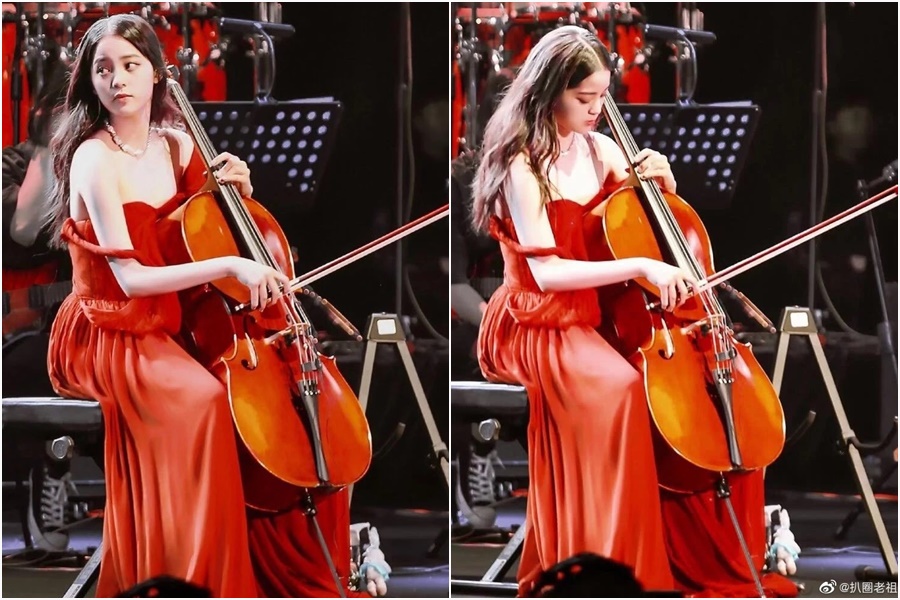 歐陽娜娜在在上海舉辦「十週年巡迴音樂會」，禮服肩帶滑落，差點就要走光。（翻攝自微博）