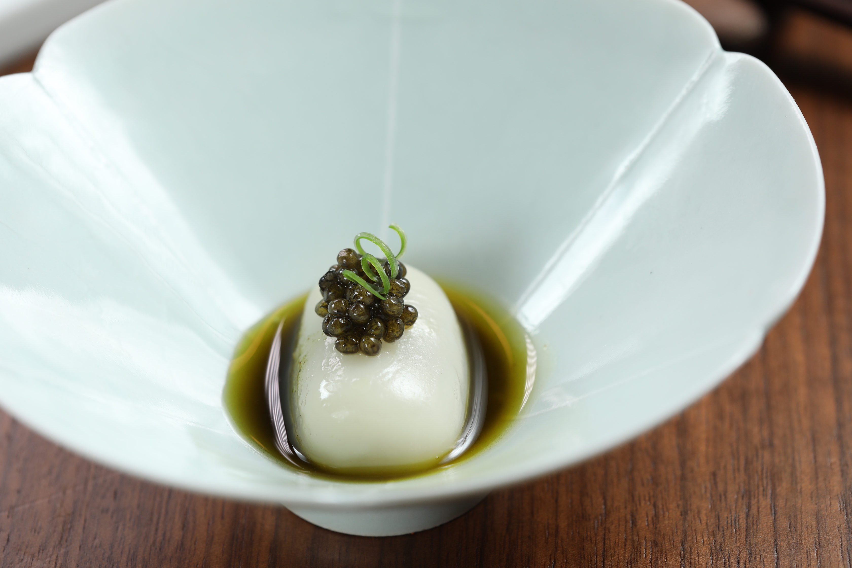 「葉兒粑」原是四川獨特的街邊小吃，廊橋的版本更為精緻化。