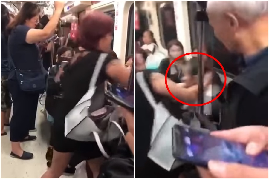 黑衣女子強扯金髮女子頭髮並拉她離開博愛座，行徑相當誇張。（翻攝自爆料公社）