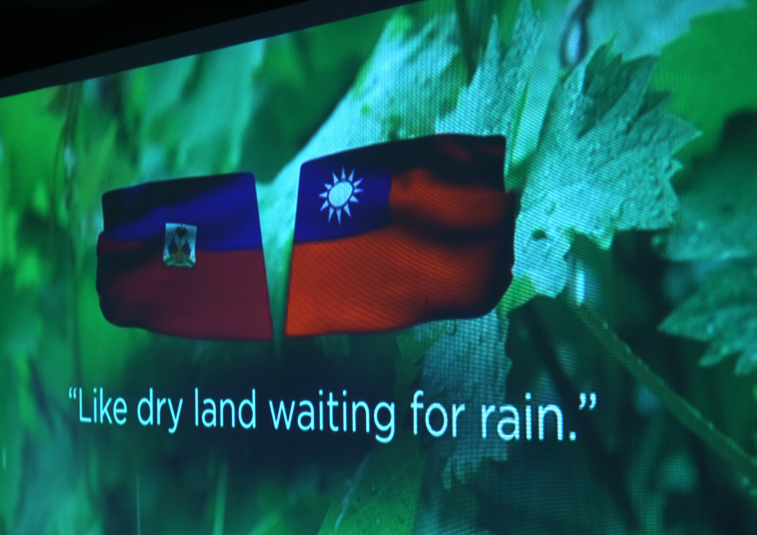 海地訪台招商代表團在簡報中，表示海地渴望台灣的投資，一如大旱之望雲霓。