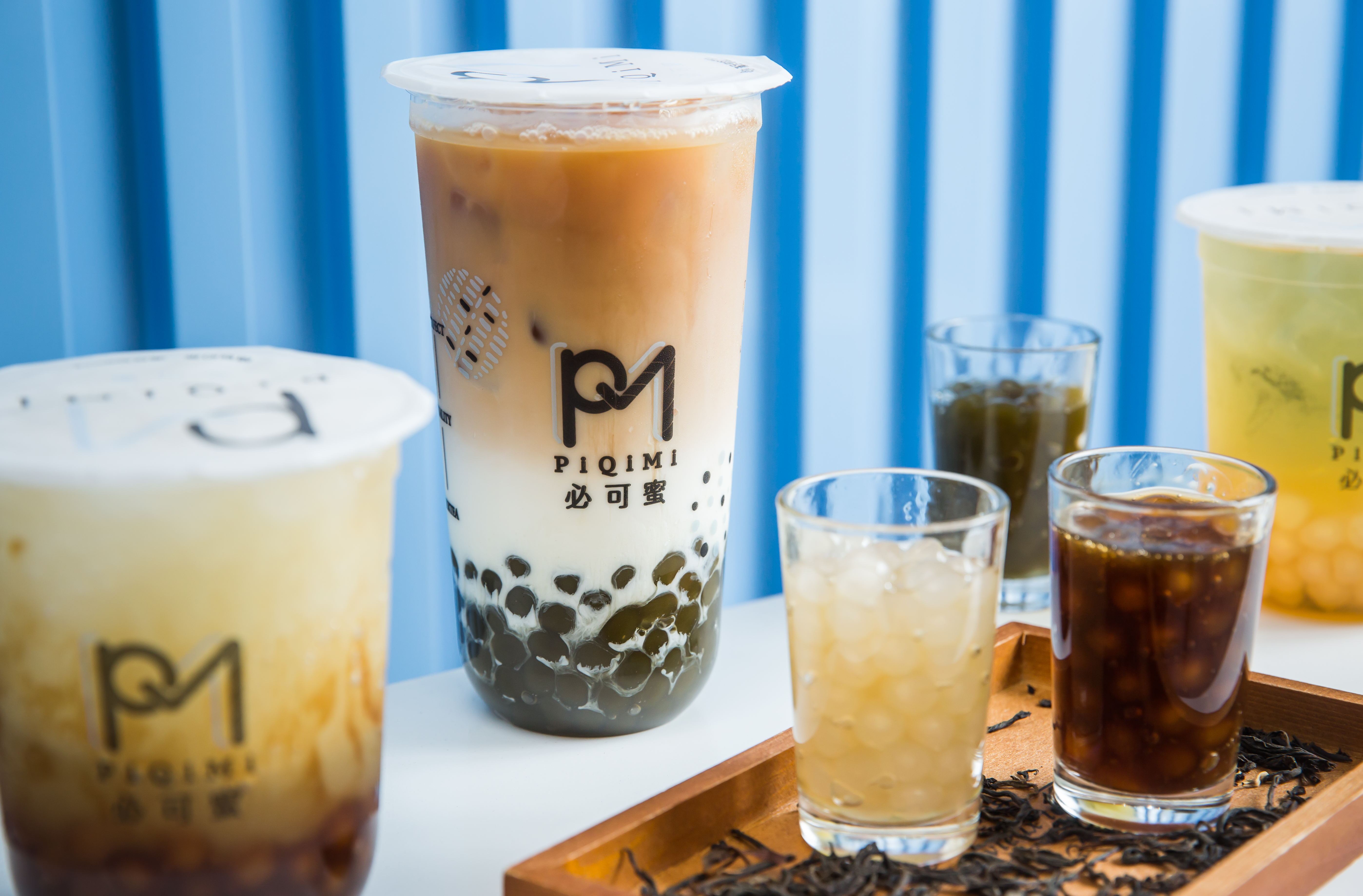 祕密花園招牌鮮奶茶加綠寶春茶珍珠，甜而不膩，喝得到茶味。（70元/大杯）