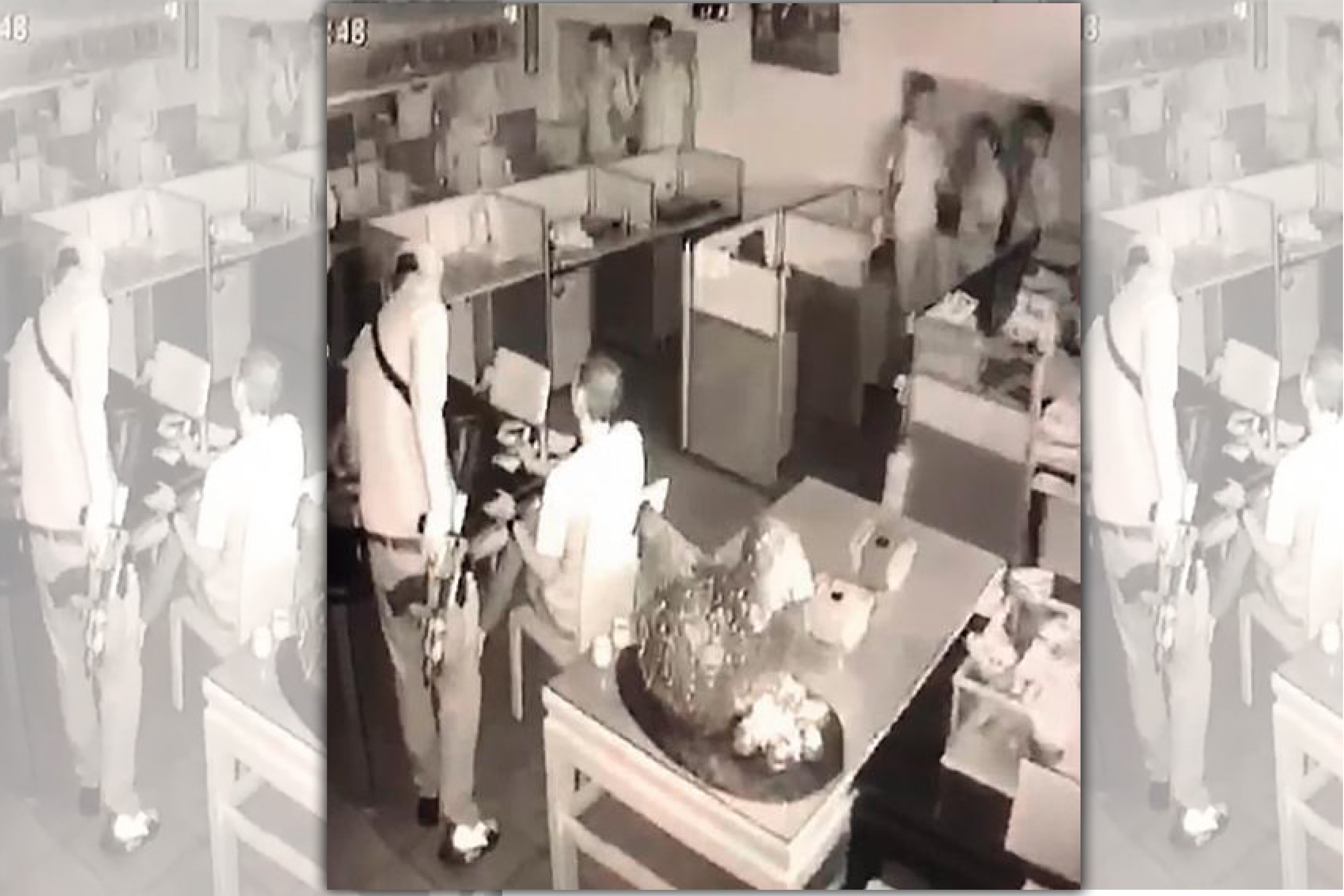 「黑人家族」靈魂人物郭信一6月曾協助警方，化解桃園車行挾持案。圖為挾持案時車行內影像。（翻攝畫面）