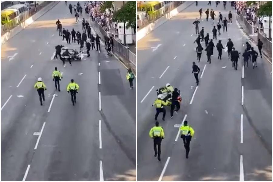 香港三罷示威，一名騎著重機的警員直接衝撞示威者，行動全程被民眾拍下。（翻攝Youtube）