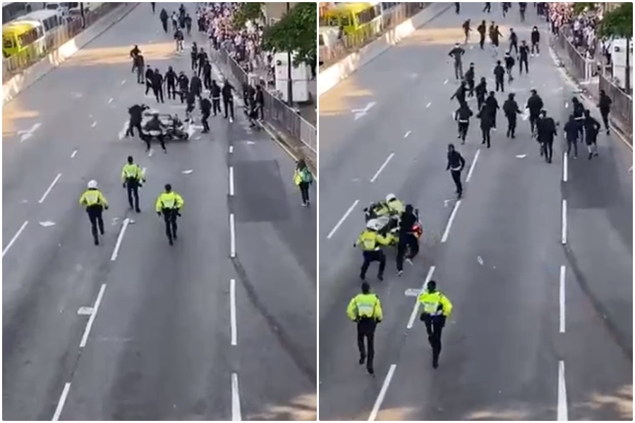 香港三罷示威，一名騎著重機的警員直接衝撞示威者，行動全程被民眾拍下。（翻攝Youtube）