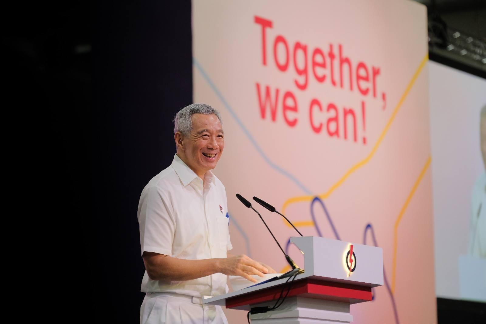 新加坡總理李顯龍於人民行動黨黨大會上表示，明年選舉將是一場硬戰。（翻攝自People's Action Party臉書）