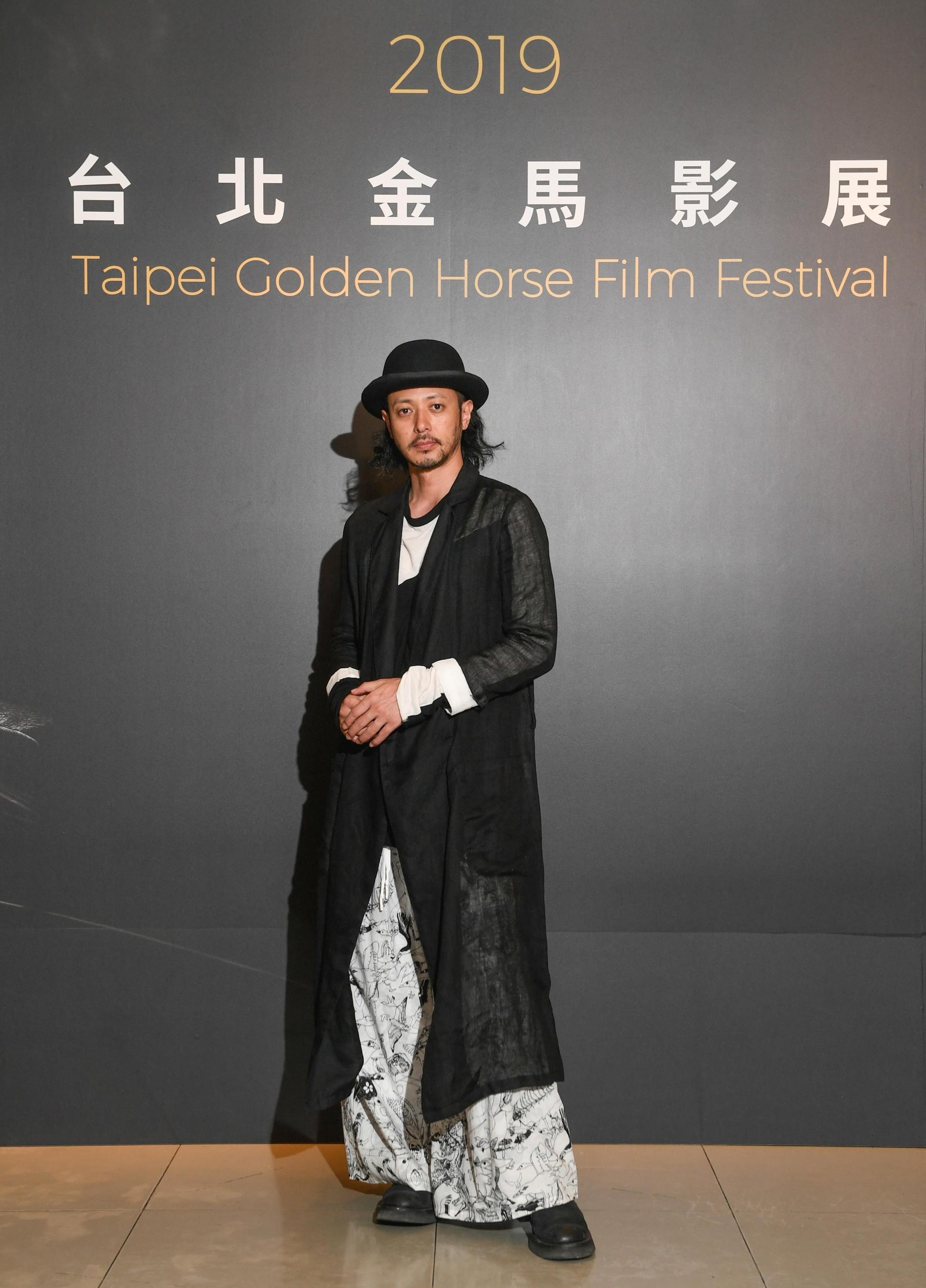 小田切讓每次現身造型都充滿個人風格。（金馬執委會提供）