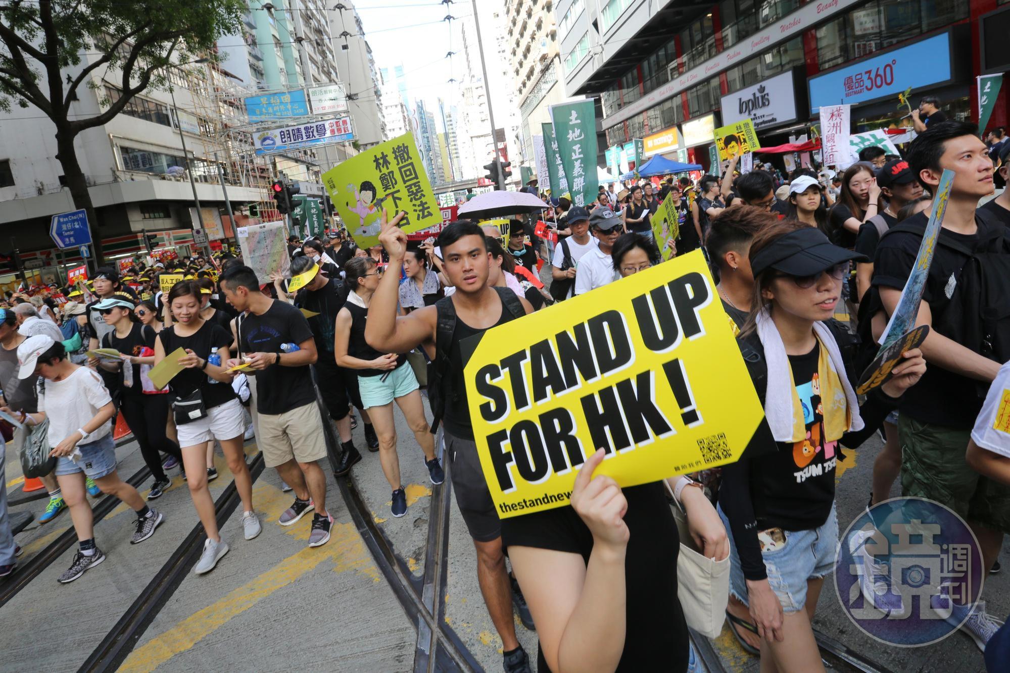 美國總統川普日前正式簽署《香港人權與民主法案》,中國官媒環時總編透露政府有意禁止起草法案人士入境。(本刊資料照)