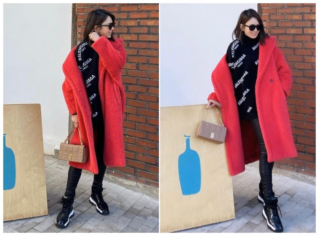 Melody一身精品打扮遊韓國,手中的BURBERRY Lola包包有著溫暖感。(翻攝自Melody IG)