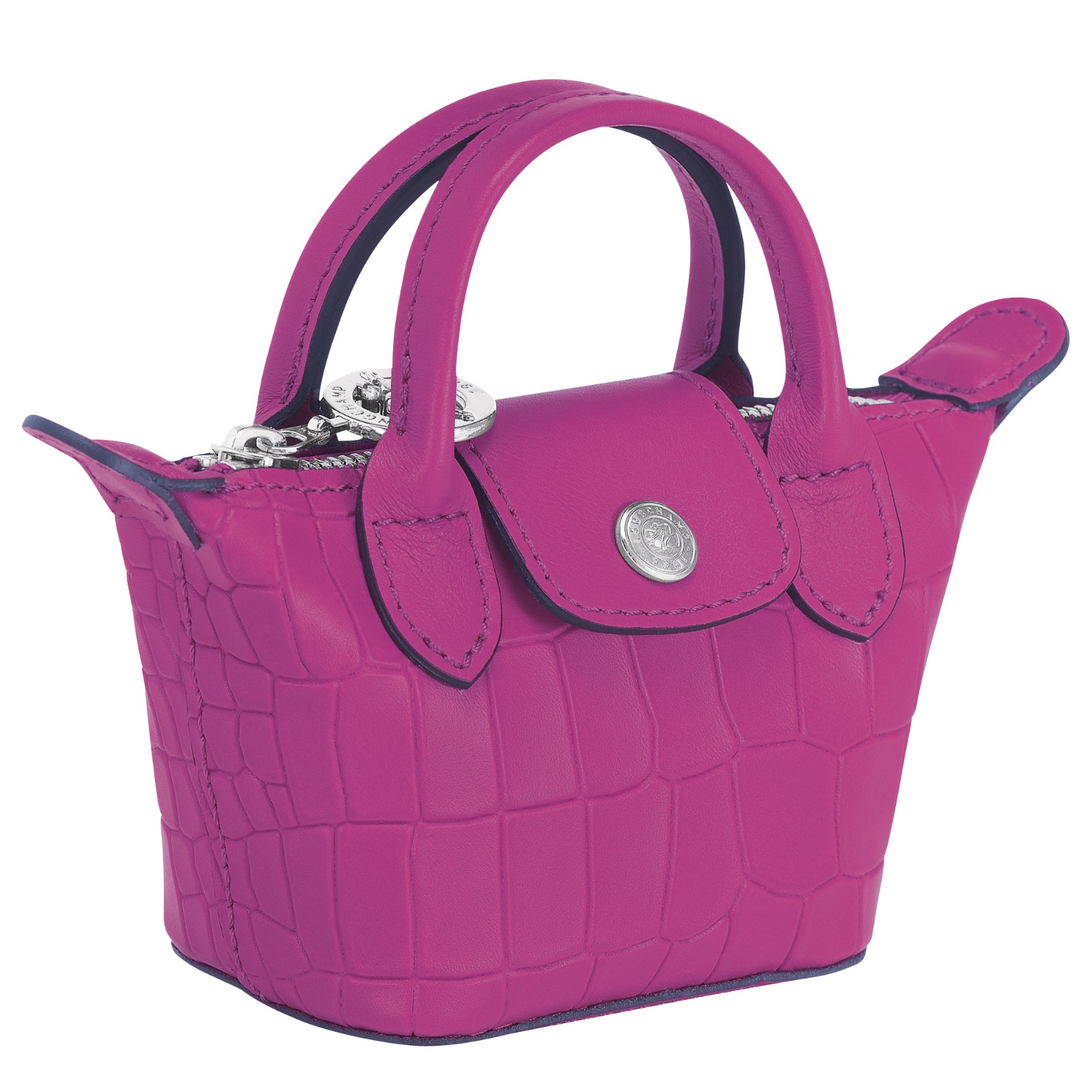 被笑稱可以裝鬼鬼腦子的LE PLIAGE CUIR CROCO系列NANO帶按扣肩背袋。NT$8,400 (LONGCHAMP提供)