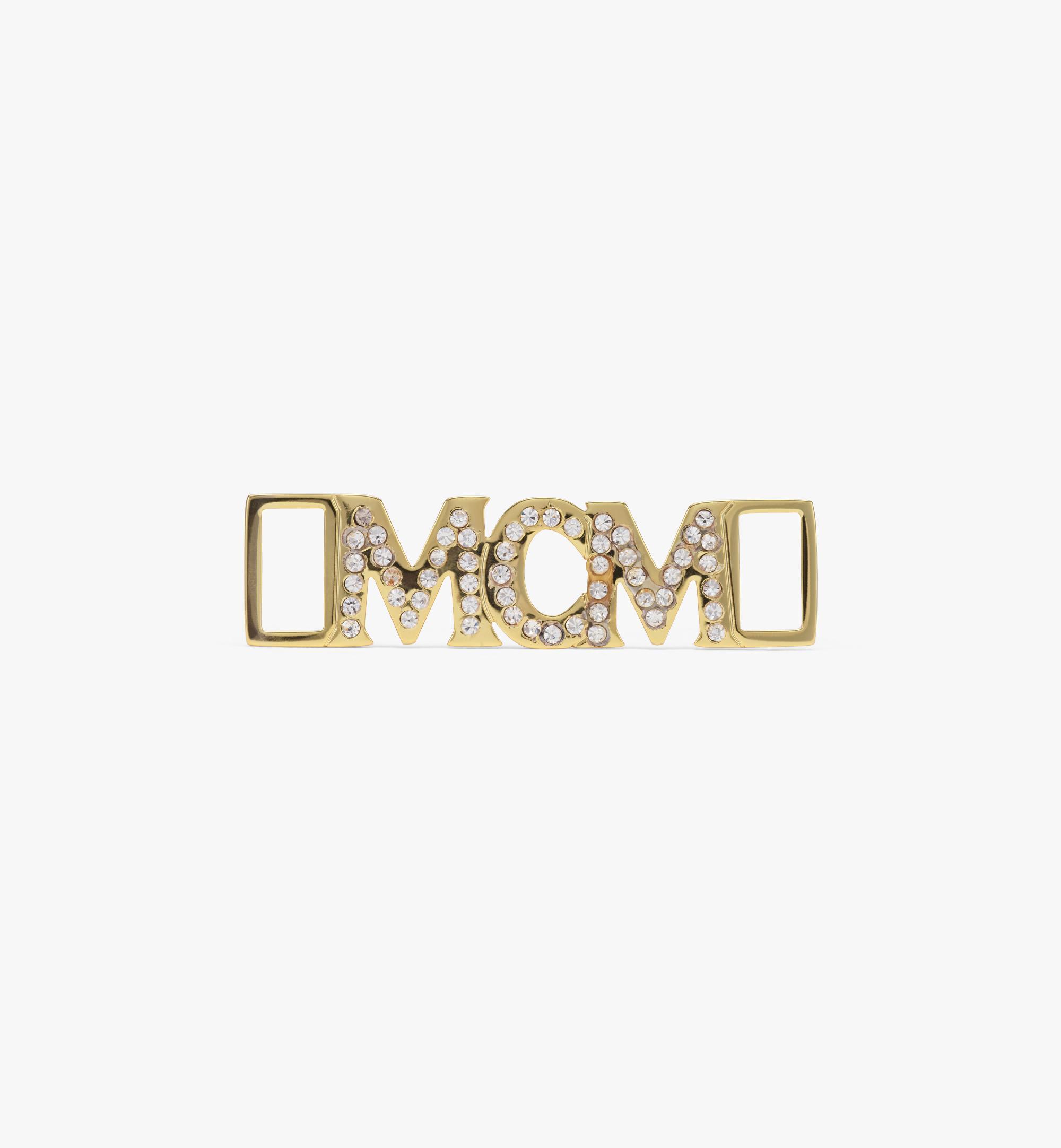 鍍金鑲施華洛世奇鞋帶釦。（MCM提供）