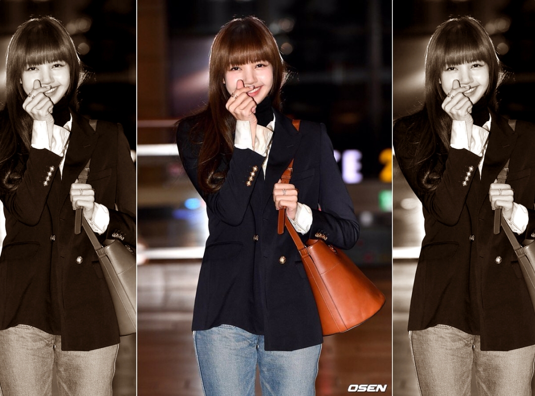 Lisa身上背著CELINE全新系列MAILLON TRIOMPHE水桶包，手比愛心。（翻攝自OSEN）