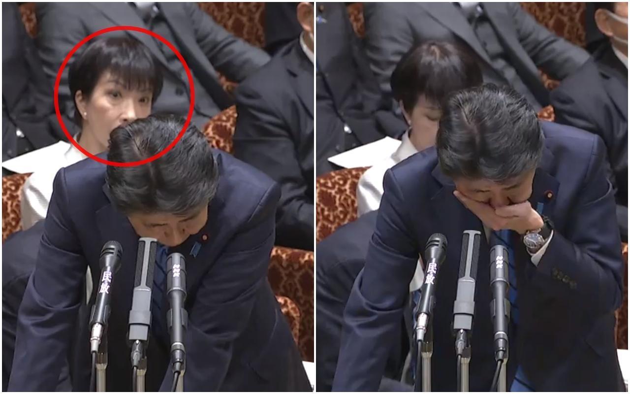 安倍晉三昨日接受質詢時,突然連續咳嗽,後方女官員(紅圈處)當場嚇傻,露出相當驚恐的表情。(翻攝自日本參議院)