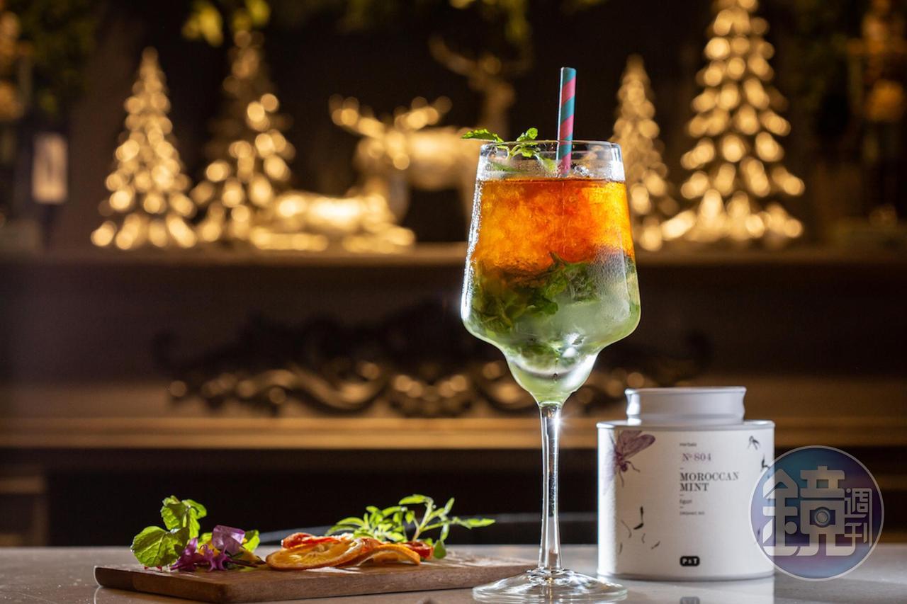 透著草綠色澤的「異域綠洲 沁涼薄荷Mojito」，清涼易飲，（260元／杯）