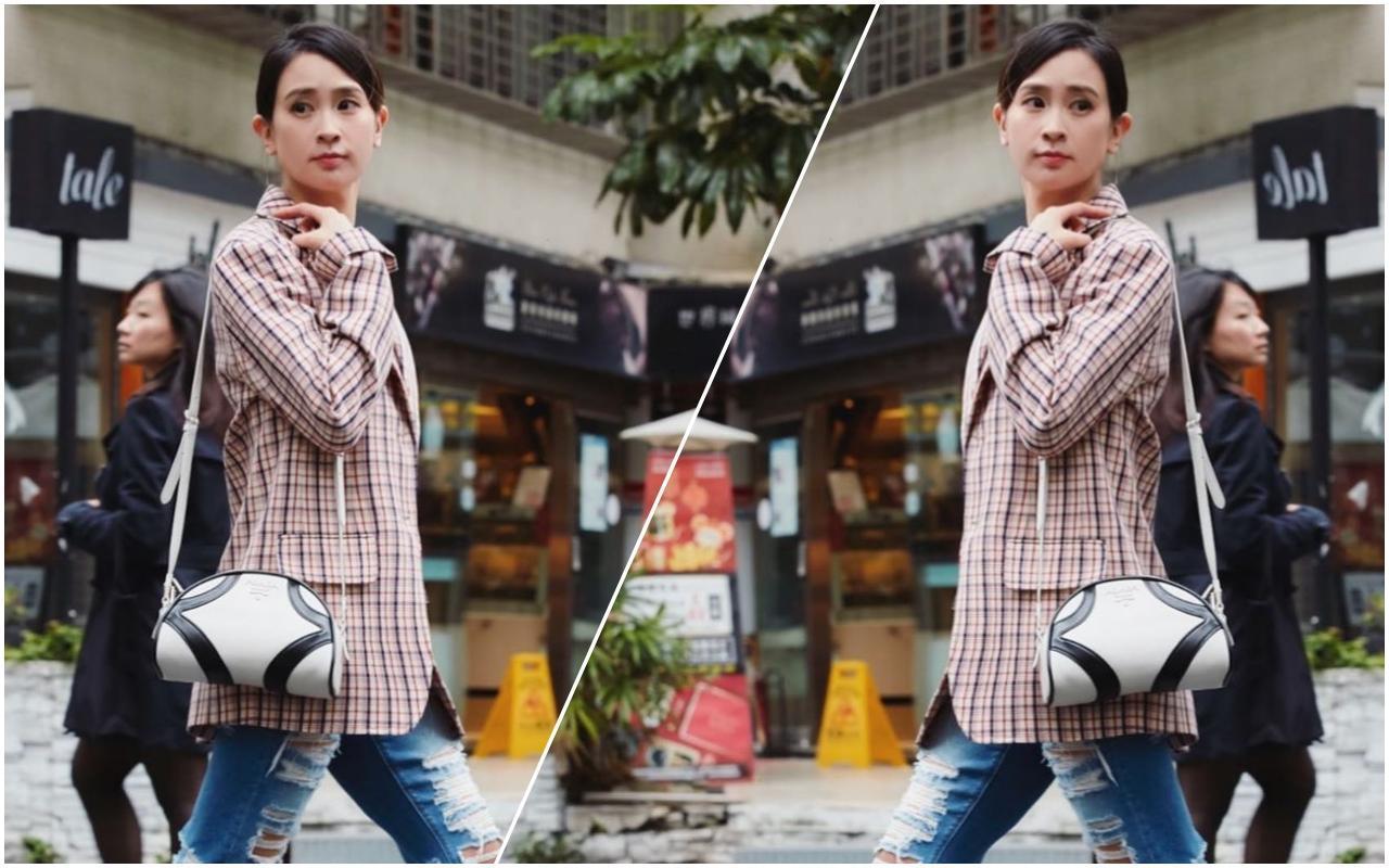 李晶晶身穿要價9萬5500元的PRADA格紋西裝外套搭配5萬3000元的小型保齡球包。(翻攝自李晶晶IG)
