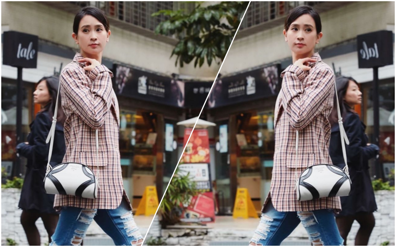 李晶晶身穿要價9萬5500元的PRADA格紋西裝外套搭配5萬3000元的小型保齡球包。（翻攝自李晶晶IG）