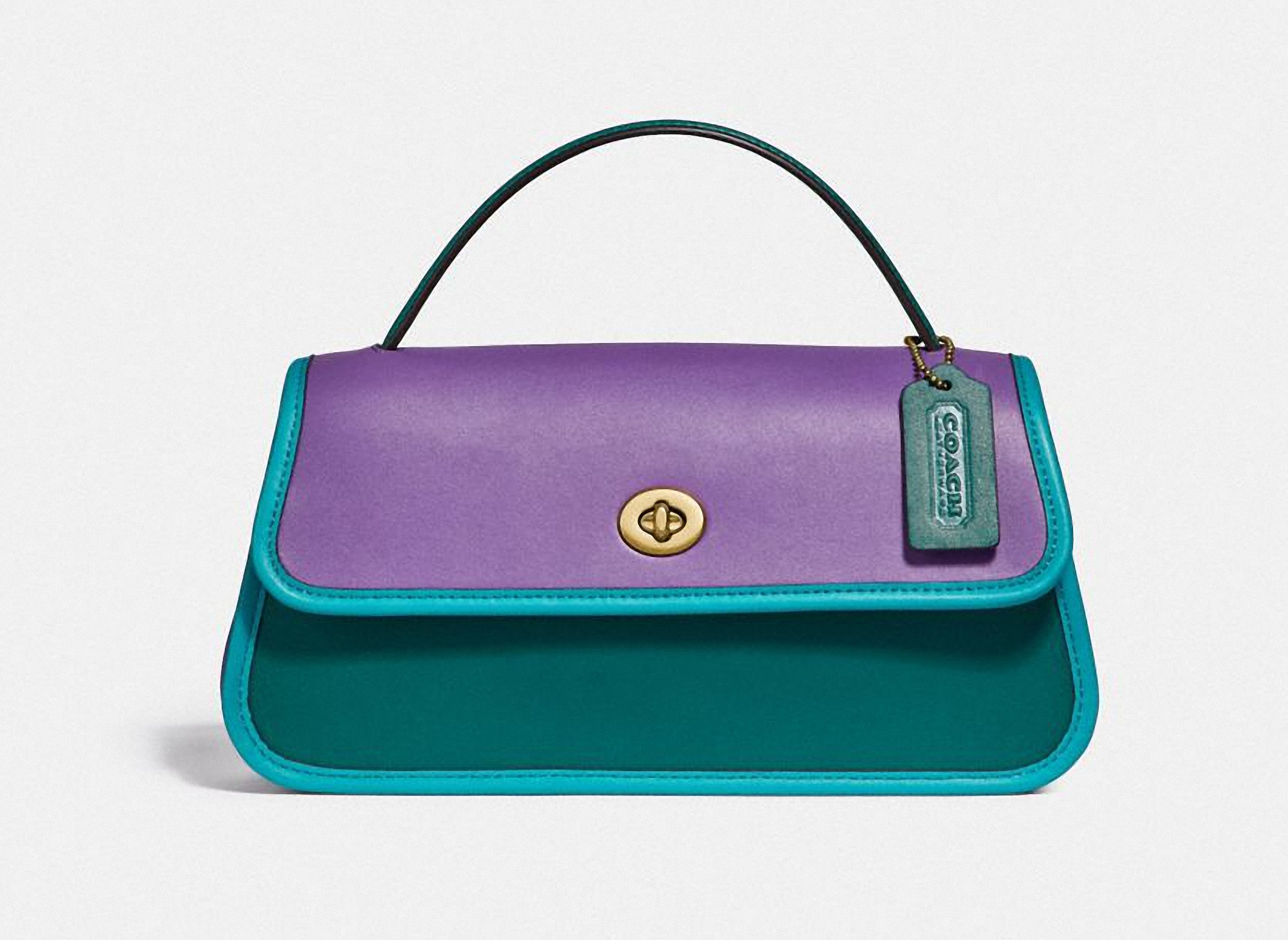 Originals Colorblock Binding Turnlock手拿包，NT$19,800。（COACH提供）