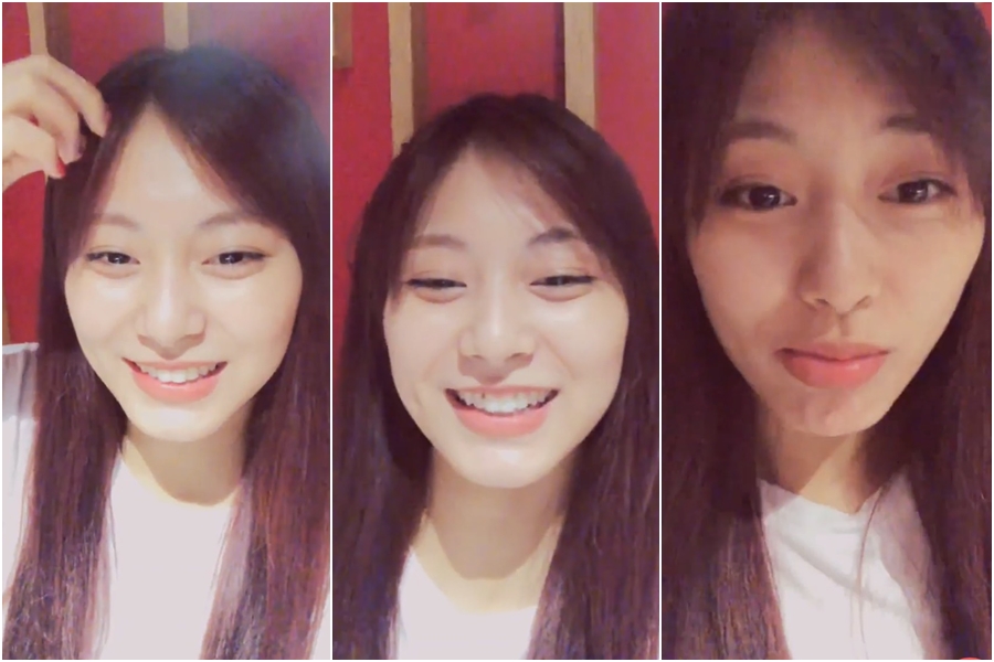 子瑜開直播久違和粉絲互動，牙縫中卻卡了菜渣。（翻攝自VLIVE）