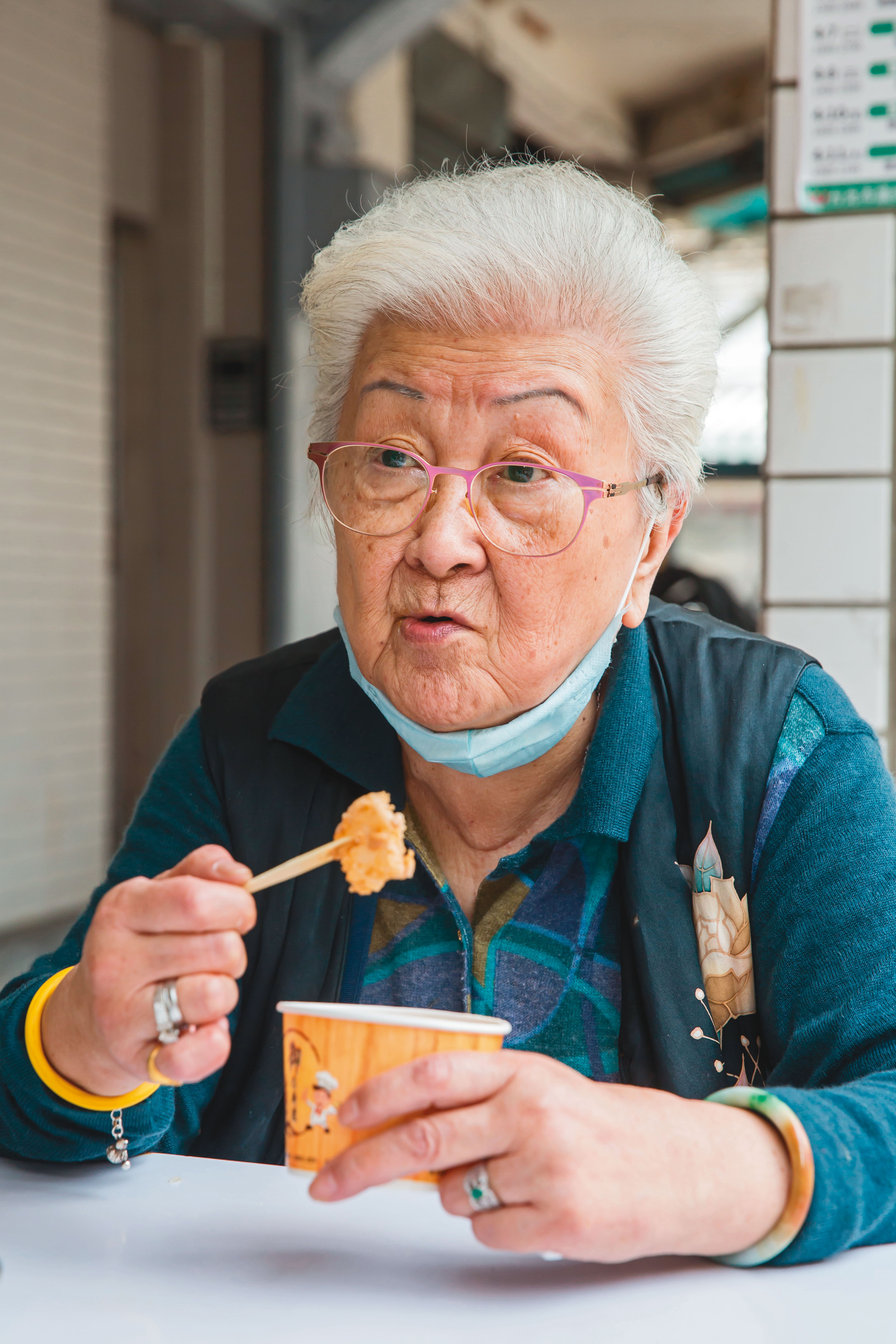 黃太太，83歲，萬華人。