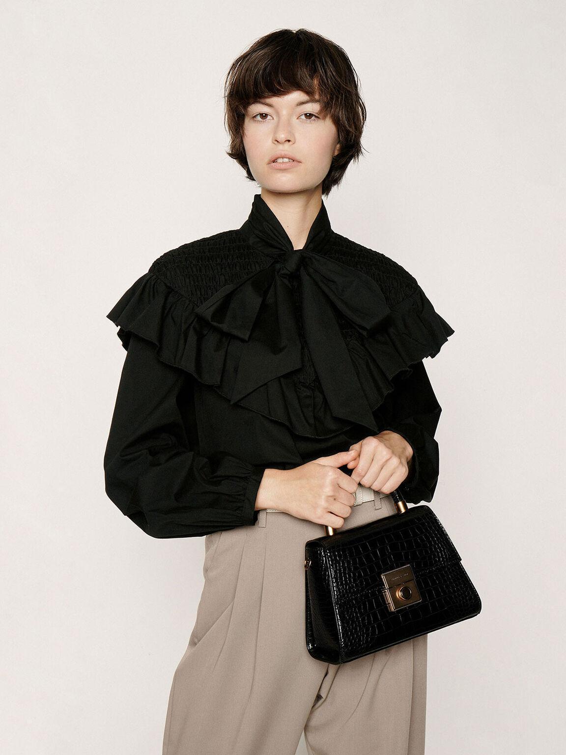 CHARLES & KEITH黑色鱷魚紋手提包。NT$2,290（CHARLES & KEITH提供）