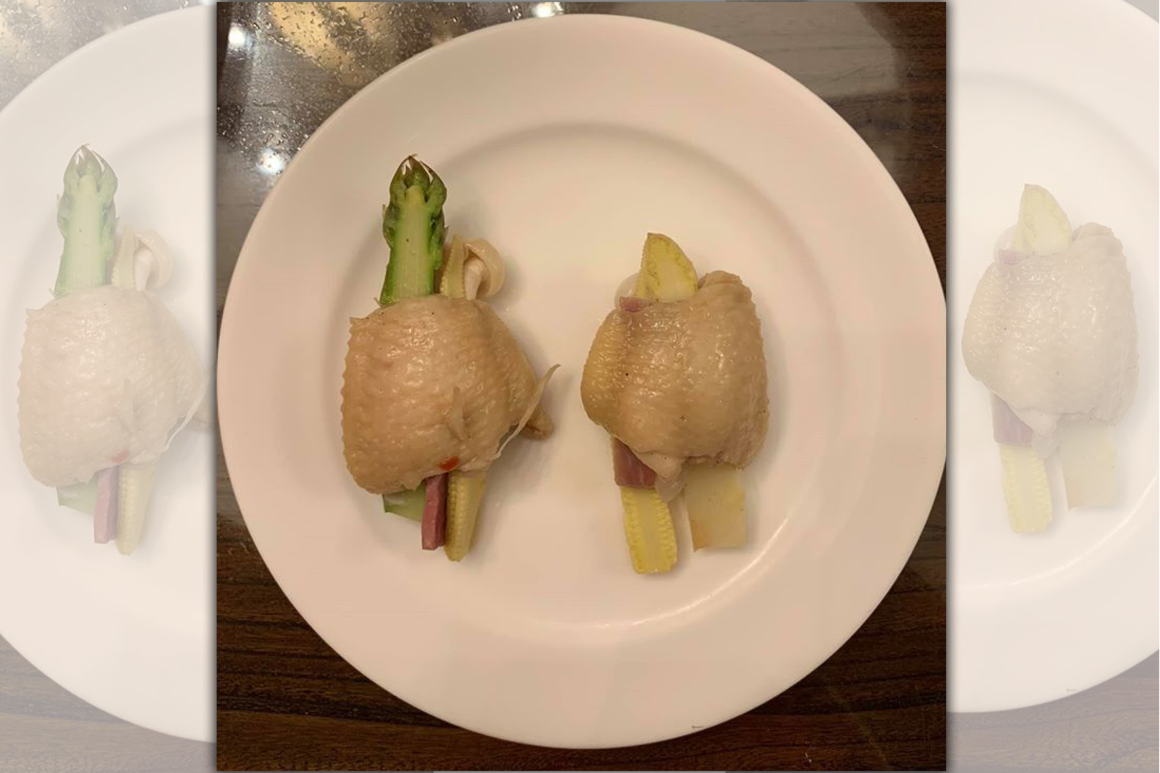 「雞翼蘆筍」這道菜是將白蘆筍與綠蘆筍穿在雞翼中，是一道很清爽的便當菜。