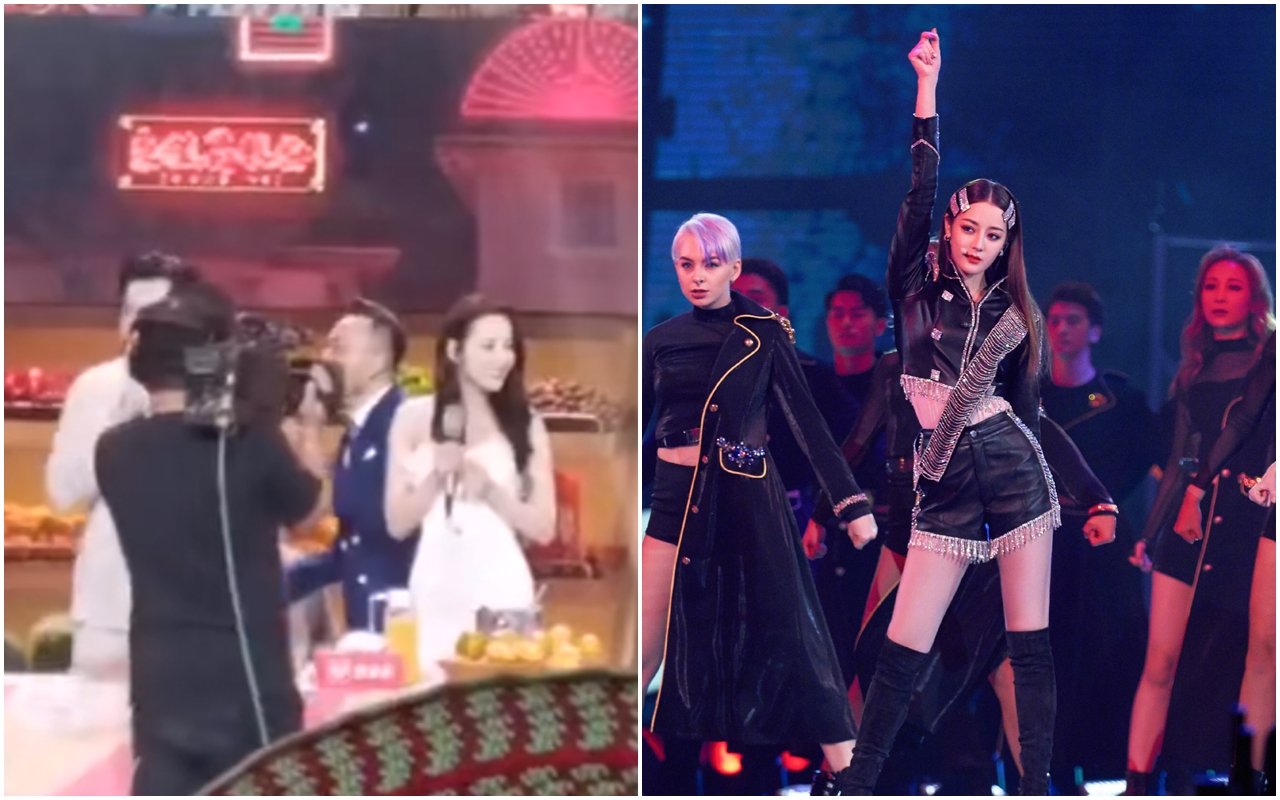 迪麗熱巴7日上直播節目《出手吧，兄弟》，突然有位男觀眾衝上台拍她肩膀、下跪求婚。（翻攝自微博）