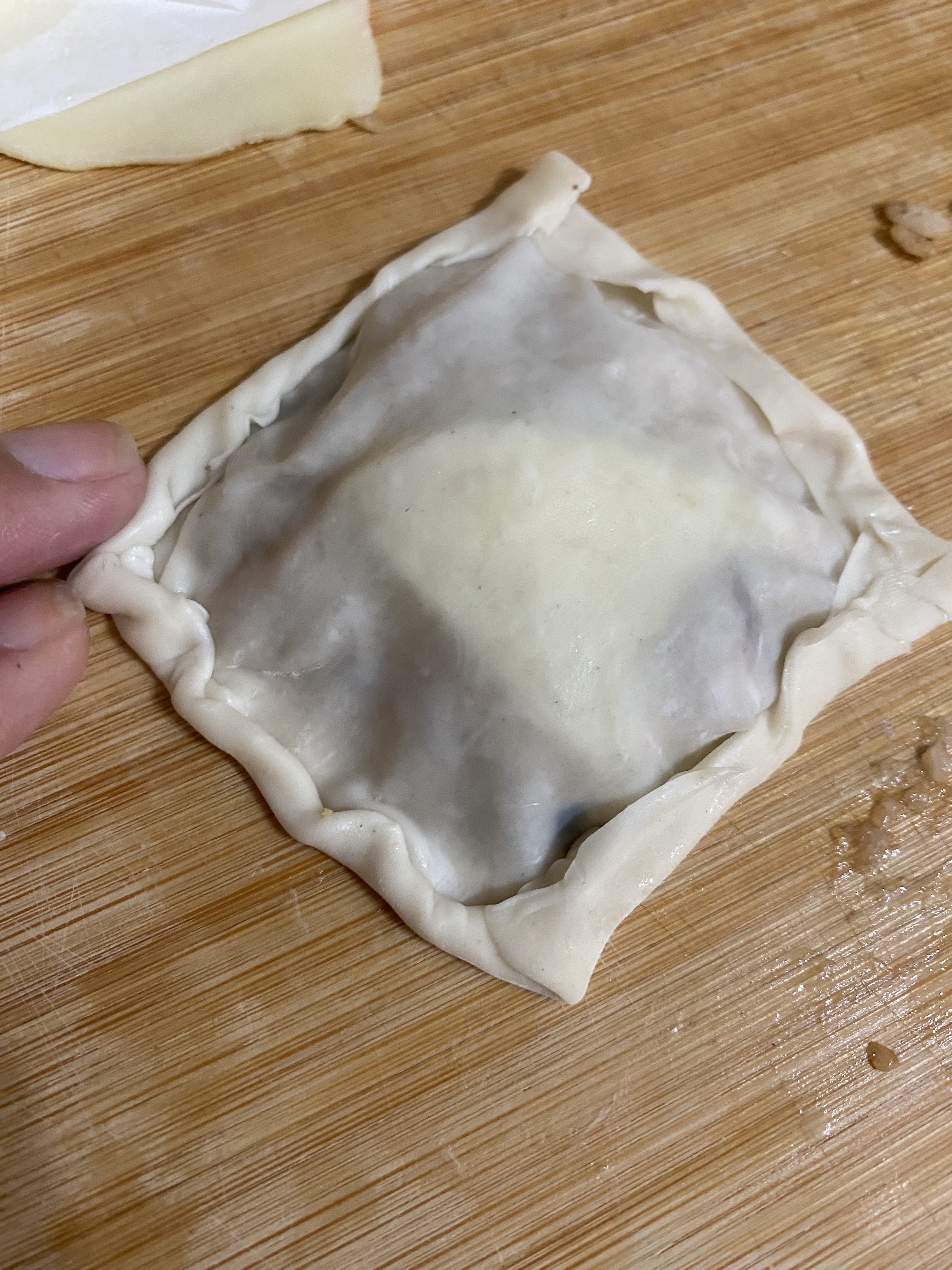 再把四邊捲起。