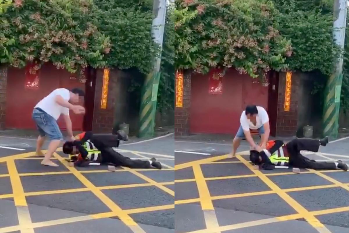 吳姓機車騎士疑不滿施工交通管制，持磚塊砸傷林姓交管人員頭部。（翻攝自爆廢公社）