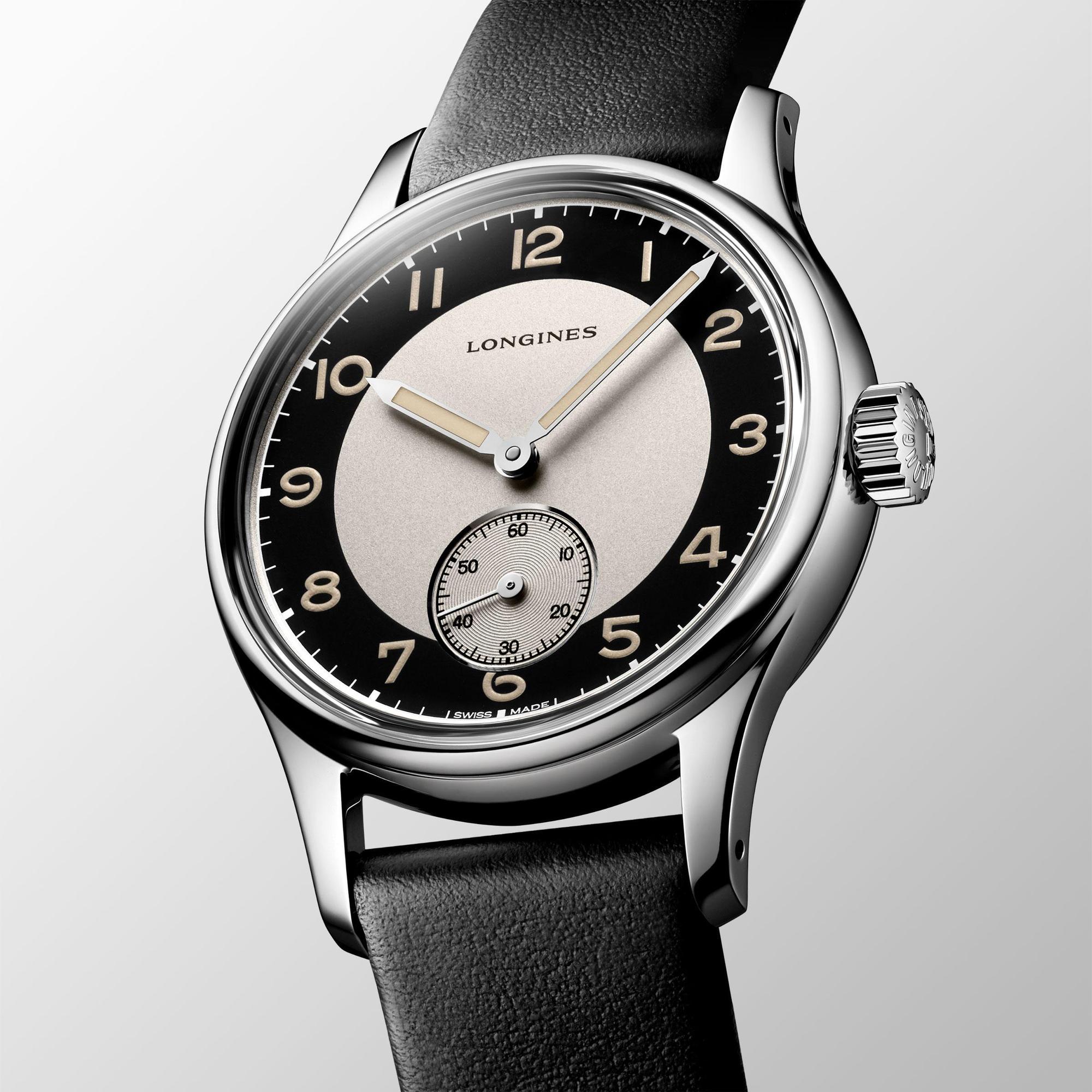 Heritage Classic Tuxedo小三針腕錶,38.5mm不鏽鋼錶殼,裝載L893.5自動上鏈機芯,配上復古牛皮錶帶,參考價約65,700。