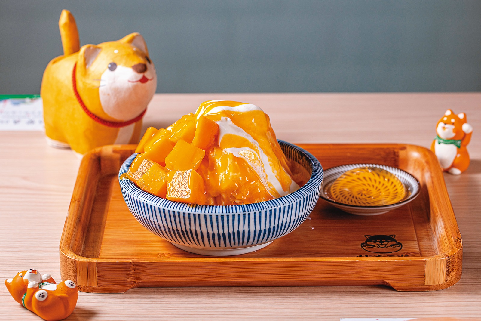 季節限定的「芒果起司蛋糕」，以芒果製作冰磚，加上芒果醬及新鮮芒果，是又香又濃的愛文滋味。（220元／份）