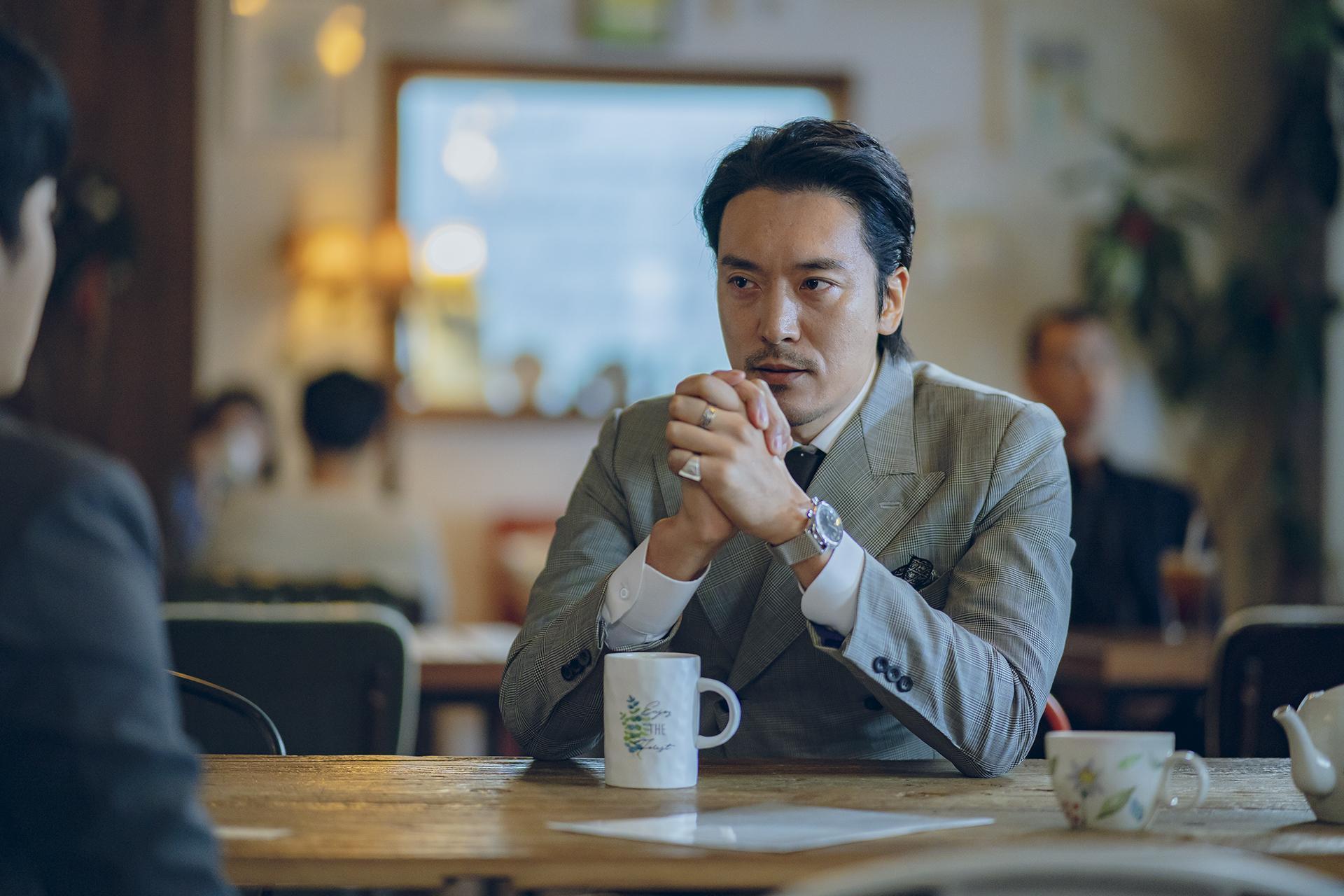 金敏俊在《我們,愛過嗎?》飾演電影投資公司代表九把刀。(Netflix提供)