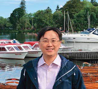 副教授王靖欣(圖)被控讓李泰山掛名論文第一作者,換取主管職位。(讀者提供)