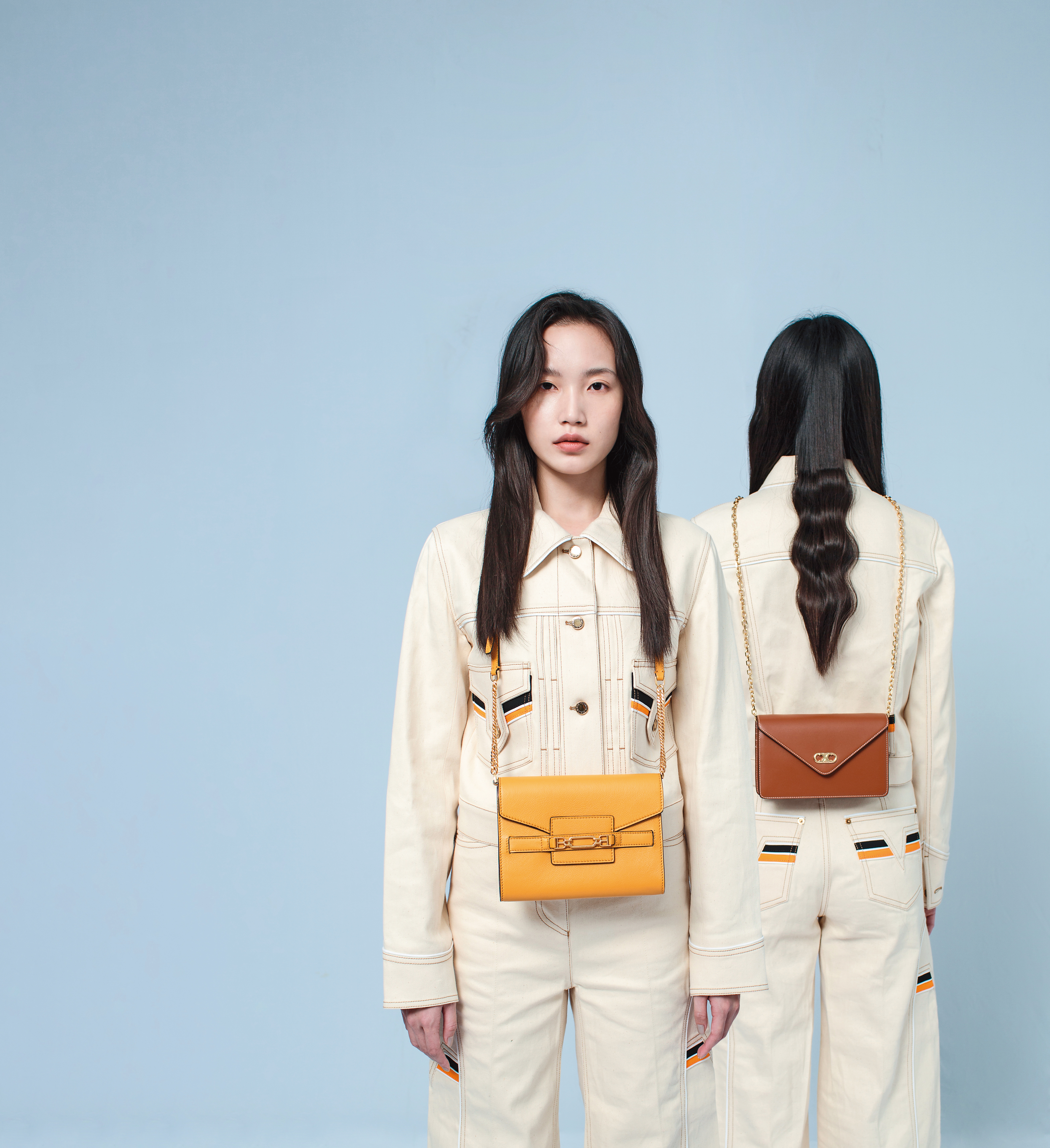 Maillon Triomphe小牛皮飾鍊WOC NT$45,000 by CELINE／Vesting黃色牛皮金屬BB釦小鍊包 NT$34,580 by BALLY／米白飾邊上衣 價格店洽／米白飾邊長褲 價格店洽 All by LOUIS VUITTON。