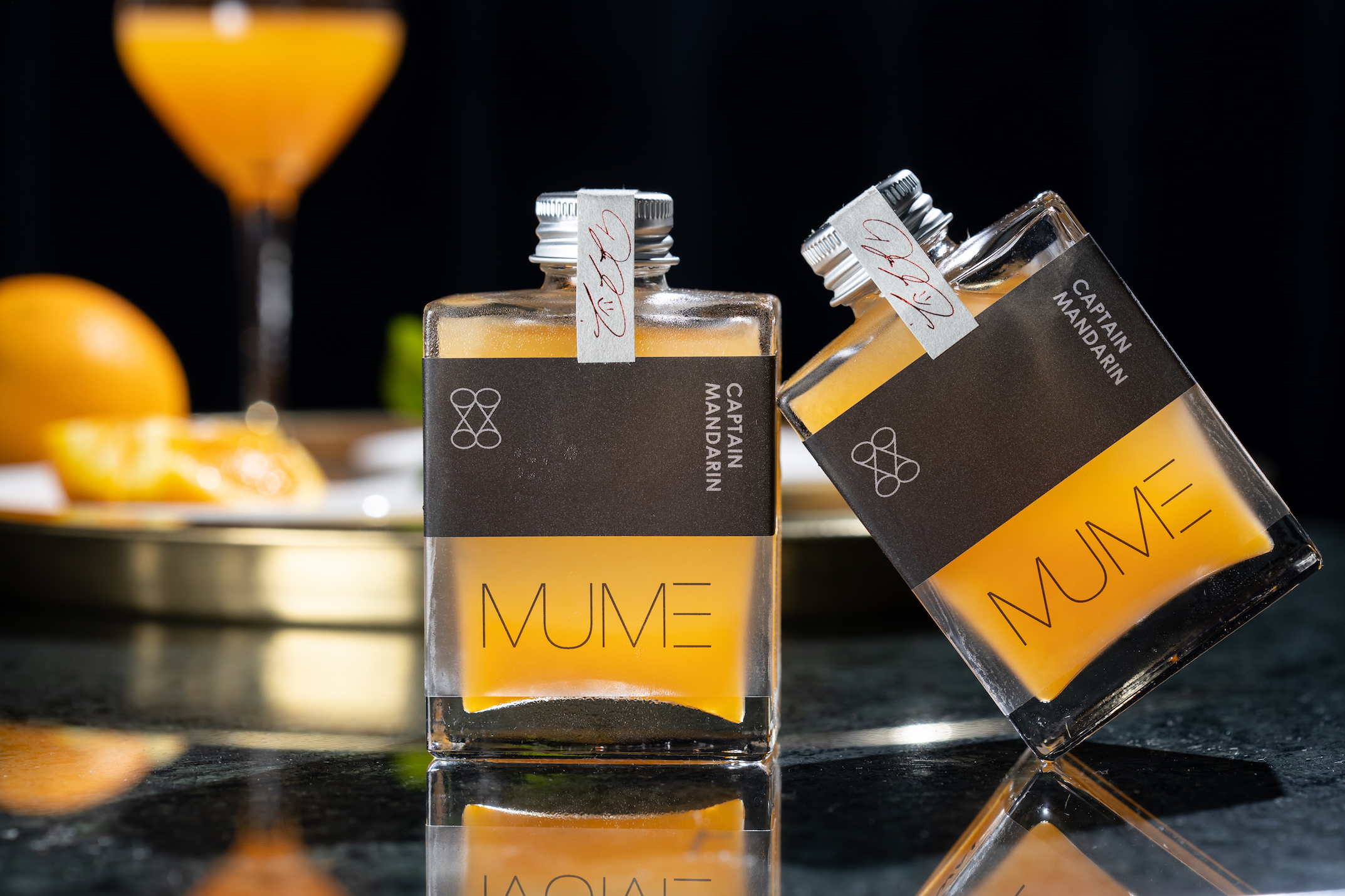 「MUME x WAT 椪柑隊長雞尾酒」以國產椪柑、金門高粱為主角，酸甜中有發酵醬香。（250元／瓶）