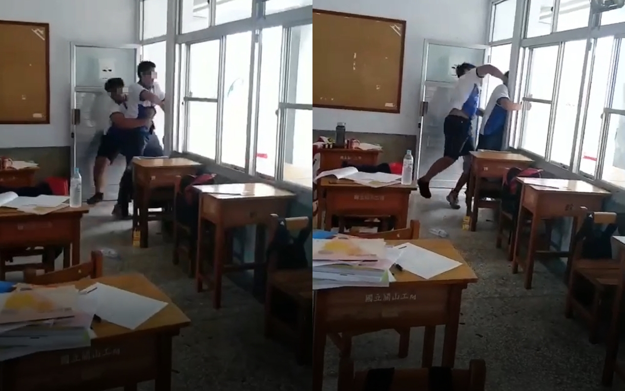 游姓同學被身材壯碩的男同學強拉回教室,還被該同學以拳頭暴打頭部。(翻攝畫面)