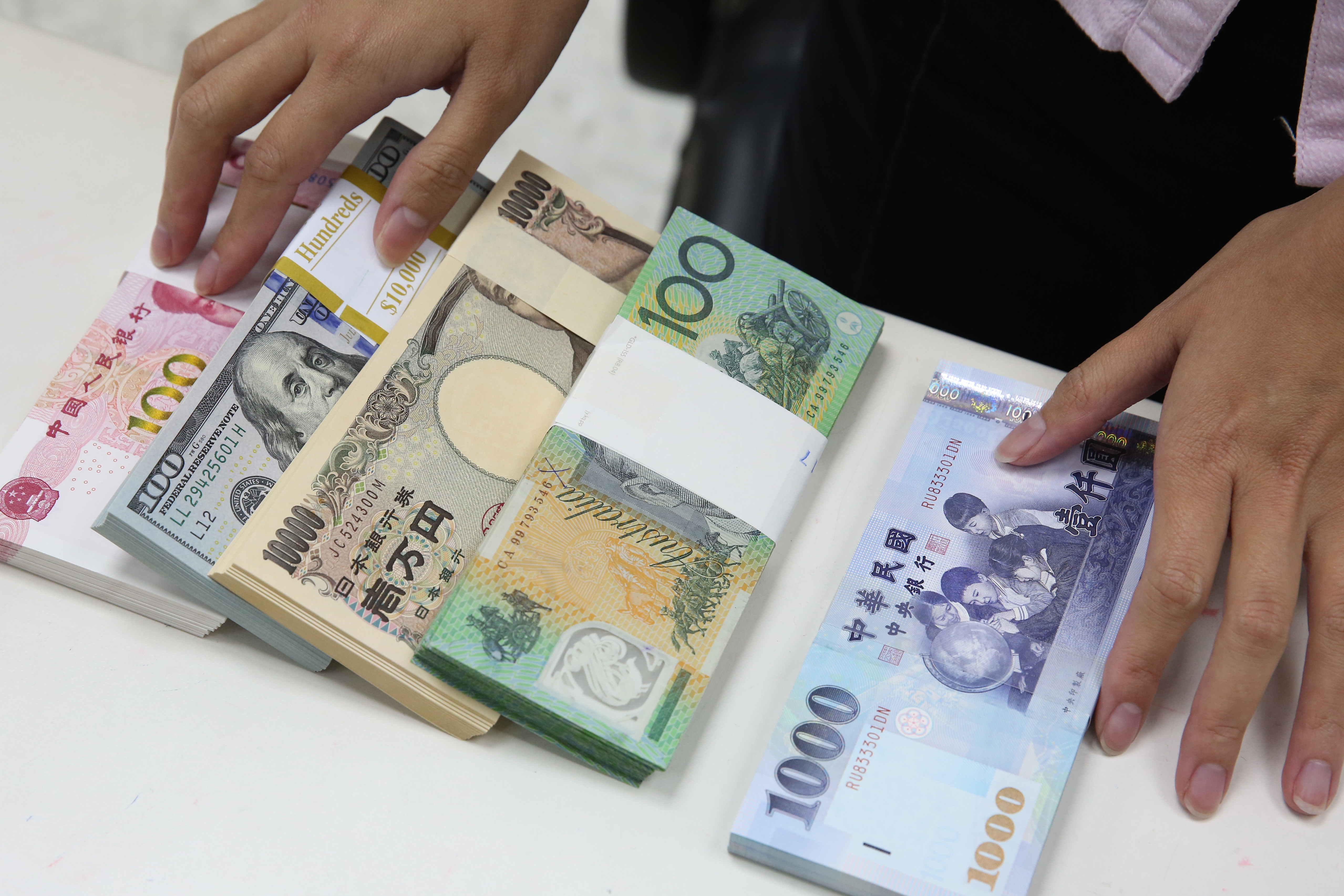 外幣定存是田臨斌資產配置的一環，常出國旅行消費的他從不煩惱匯兌風險。